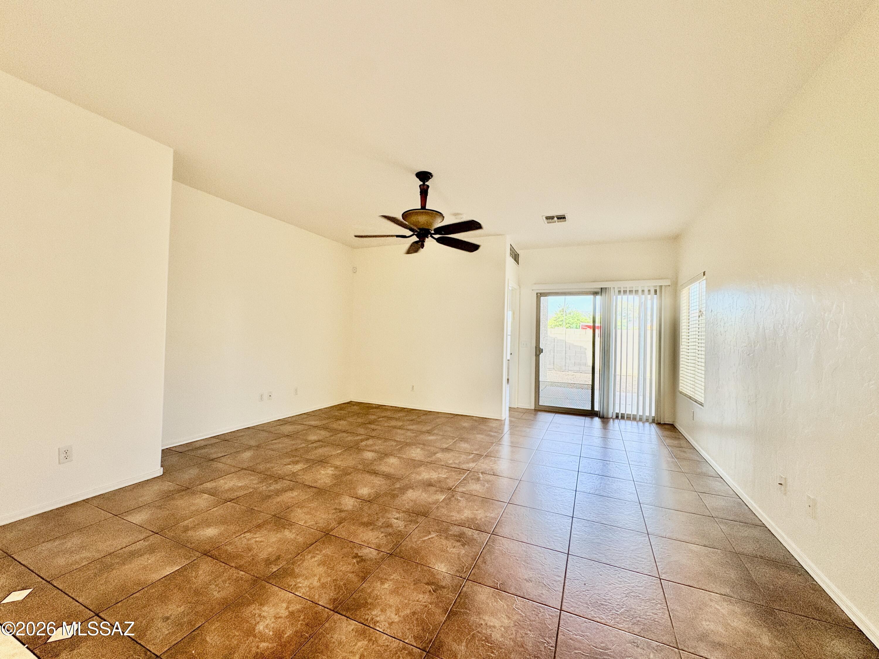 This one won't last long! Amazing 3bed/2bath located in convenient eastside location! Close to Target, grocery stores and more! Spacious kitchen with gas range and plenty of cabinet and counter space, dedicated dining area as well. Wonderful split floor plan with Primary Suite that includes large walk-in closet and bathroom with walk-in shower.  2 other bedrooms are spacious too, and no carpet! Good size low maintenance back yard with covered patio. Pet Friendly. A/C. Ceiling Fans throughout for added comfort. W/D hookups. This home has it all! Hurry before it's gone!