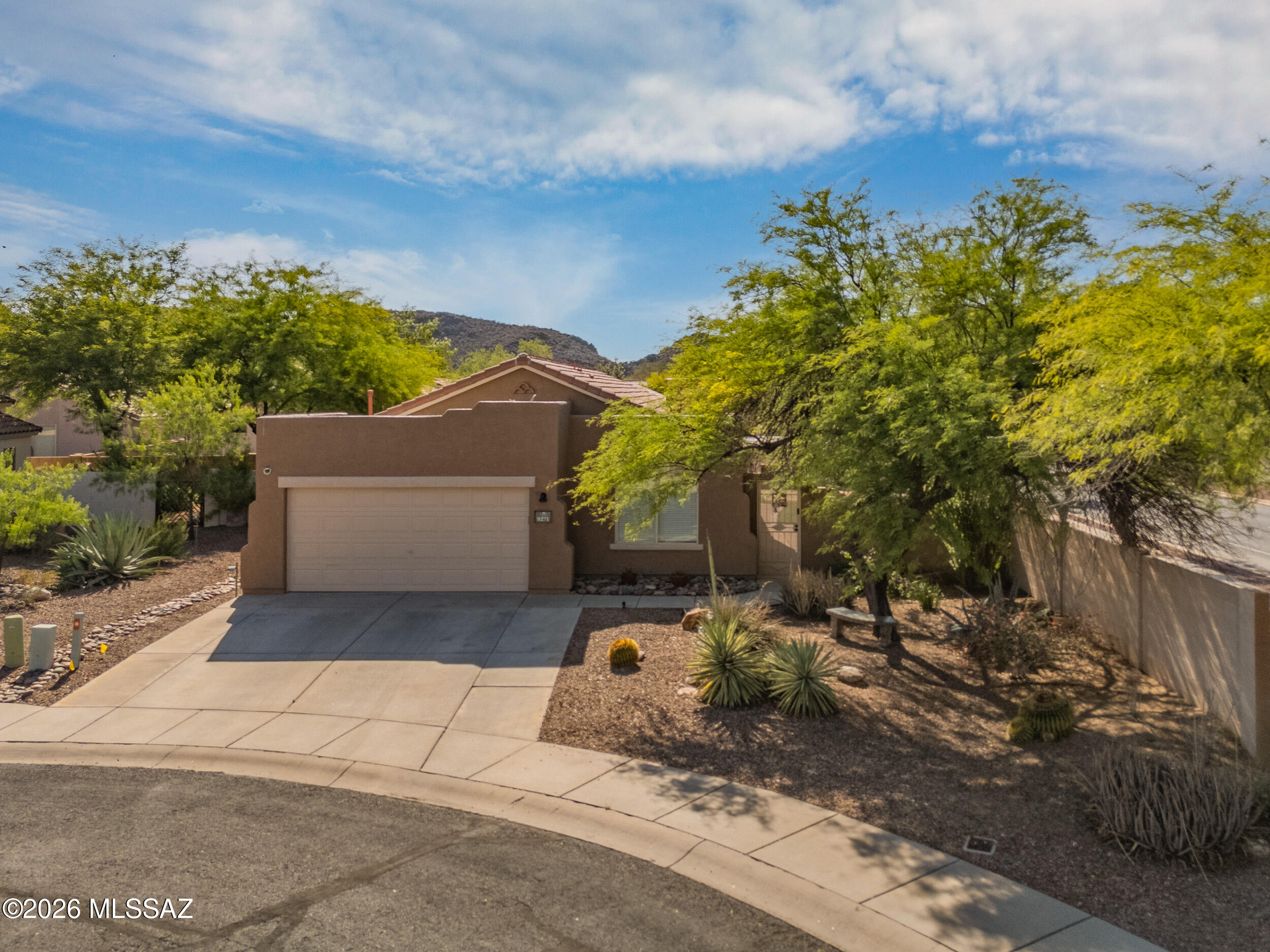Welcome to 9271 N Crystal Moon Court, tucked away in a quiet cul-de-sac in desirable Continental Ranch. This beautifully maintained home features a secluded front entry, bright open living spaces, a dual fuel oven, custom coffee bar, and electric vehicle charger plug. The backyard is built for entertaining with a hot tub and inviting outdoor space perfect for relaxing or hosting guests. Enjoy access to Continental Ranch amenities including community pools, parks, and walking paths, all while being conveniently located near shopping, dining, and more.