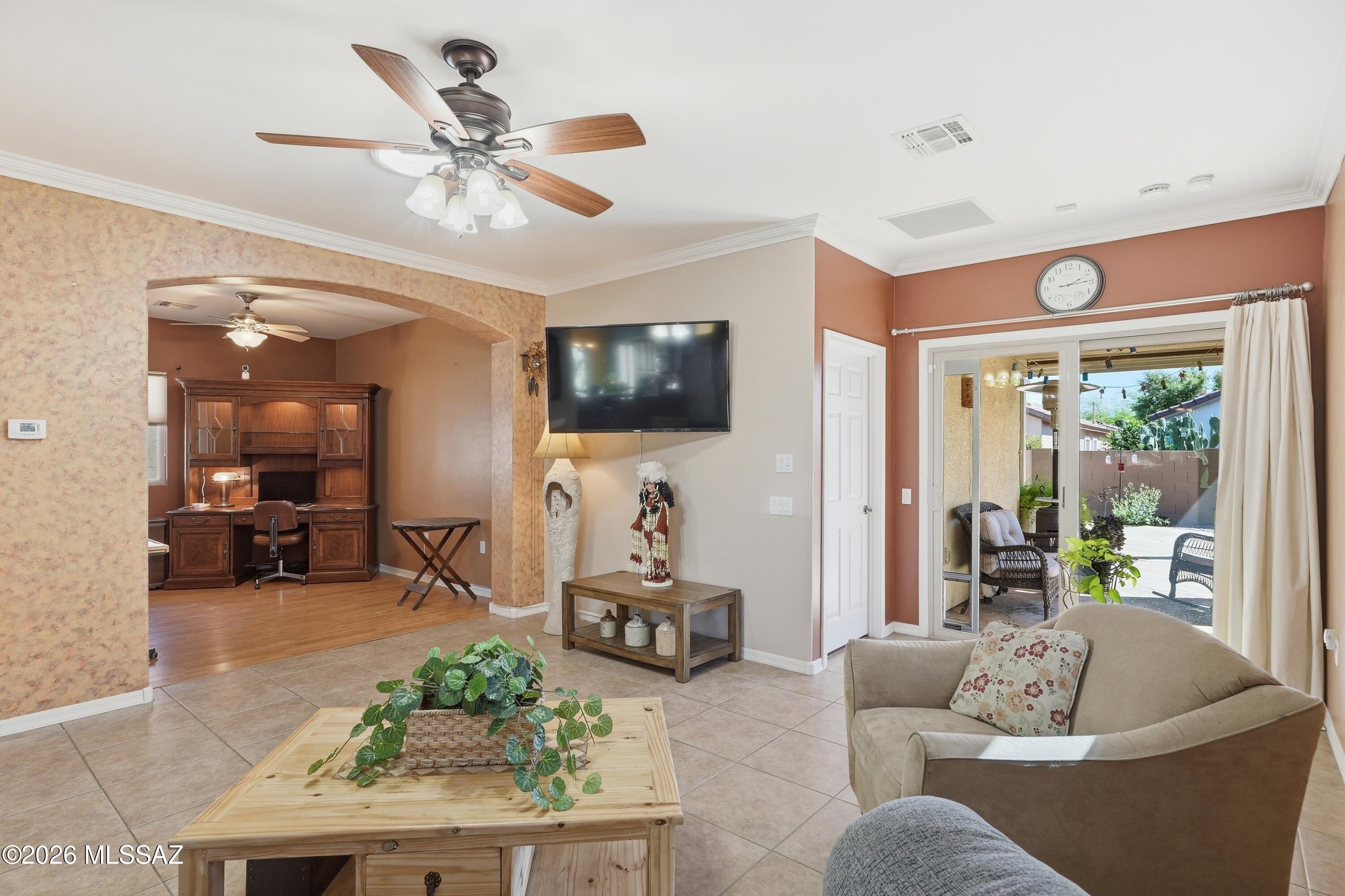 This exceptional 2-bedroom, 2-bath home with a den is located in the desirable Del Webb 55+ community and features an open floor plan with split bedrooms for added privacy.  The upgraded kitchen includes granite countertops, premium cabinetry, a backsplash, a breakfast bar, a pantry closet, and an eating area.  The interior offers easy-care flooring with no carpet, combining laminate, vinyl and ceramic tile.  The spacious primary suite includes a bay window and a walk-in closet.  The versatile den can serve as an office, craft room, or additional guest space.  Appliances convey, including a newer refrigerator and washer.  The home features mature, low-care landscaping in both the front and back yards.  The backyard offers an extended flagstone patio, a pergola, and a water feature creating a private outdoor retreat ideal for entertaining.  Owned solar provides significant energy savings.  Additional features include a two-car garage and a single-level layout with a tile roof and stucco exterior.  Residents enjoy access to resort-style community amenities, including a clubhouse, fitness facilities, pool, spa, tennis, pickleball, walking and biking trails, lake areas, and multiple social and recreational activities.

Newer furnace was installed in 2019 provides efficient, reliable heating.
Newer air conditioner from 2019 ensures cool comfort throughout the summer.
Newer hot water heater and recirculating pump offer quick and consistent hot water.
Newer refrigerator adds updated convenience and efficiency to the kitchen, along with a newer washer
Smoke detectors were replaced in 2020 for enhanced safety.
Upgraded cabinetry with soft-close drawers adds premium function and style.
Kitchen features upgraded granite counters for a timeless high-end finish.
Upgraded lighting fixtures create a warm, modern ambiance.
Water softener enhances water quality throughout the home.
Owned solar delivers valuable energy savings.
Garage includes temperature control and fans for improved comfort.
Pergola and extended flagstone patio create an inviting outdoor living space.
Beautiful water feature adds relaxation and charm to the backyard retreat.
Just move in and enjoy the retirement era that you deserve