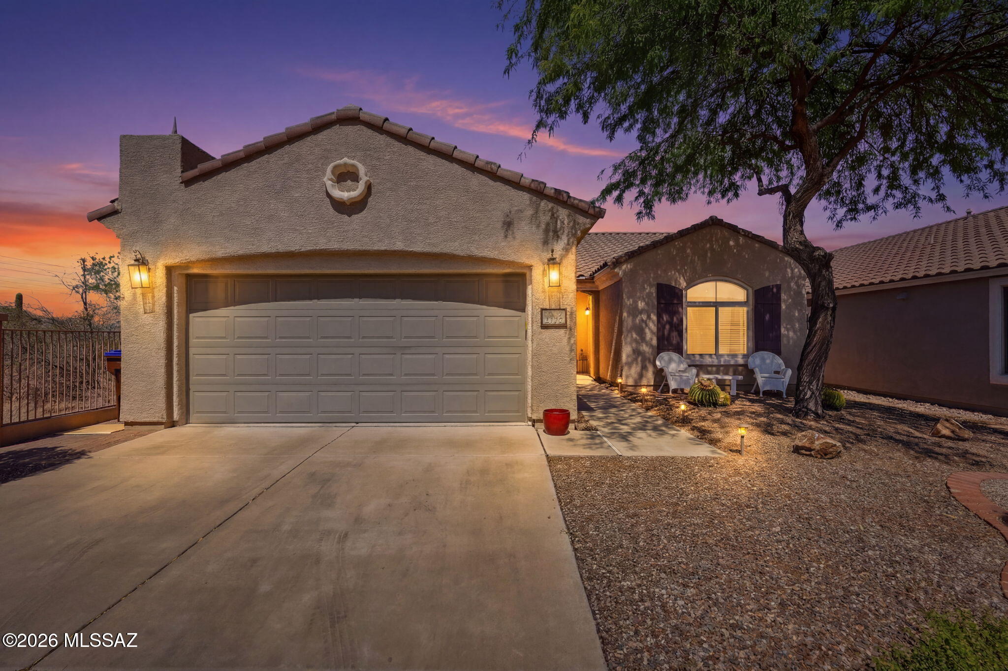 Every great Arizona day begins with a view--and this home delivers one you'll never tire of. Tucked away at the end of a quiet cul-de-sac in the desirable active adult community of Sonora at Rancho Sahuarita, this beautifully maintained Pulte-built Amado floor plan offers the rare combination of breathtaking scenery and exceptional privacy. With no neighbors behind or on the west side, you'll enjoy uninterrupted desert landscapes, majestic mountain views to the north and west, and spectacular Arizona sunsets from the comfort of your own backyard. Even better, this home is offered FURNISHED, making it easy to move in and immediately begin enjoying the relaxed desert lifestyle. A decorative wrought iron security door welcomes you into a bright, open floor plan designed for comfortable everyday living and effortless entertaining. The spacious kitchen overlooks the great room and features Corian countertops, a center island, an elevated dishwasher for added convenience, a gas range, tiled backsplash, and a generous pantry closet. The peaceful primary suite is the perfect place to unwind, featuring a charming bay window that frames the beautiful surroundings, plush carpeting, a large walk-in closet, dual vanities, and a spacious walk-in shower. The thoughtfully designed laundry room includes a folding counter and overhead storage cabinets to keep everything organized. Step outside and discover what truly sets this home apart. The professionally landscaped backyard is designed to showcase the panoramic desert and mountain views with an open view fence, creating an ideal setting for morning coffee, evening sunsets, and visits from Arizona's native wildlife. Additional updates include an irrigation system upgrade and a water softener that's only two years old, providing added value and peace of mind. As a resident of Sonora at Rancho Sahuarita, you'll enjoy exclusive amenities including a resort-style pool and spa, fitness center, pickleball courts, clubhouse, and a vibrant calendar of social activities--all designed to help you make the most of Arizona's active adult lifestyle. This is more than a home--it's a front-row seat to the beauty of the Sonoran Desert.
