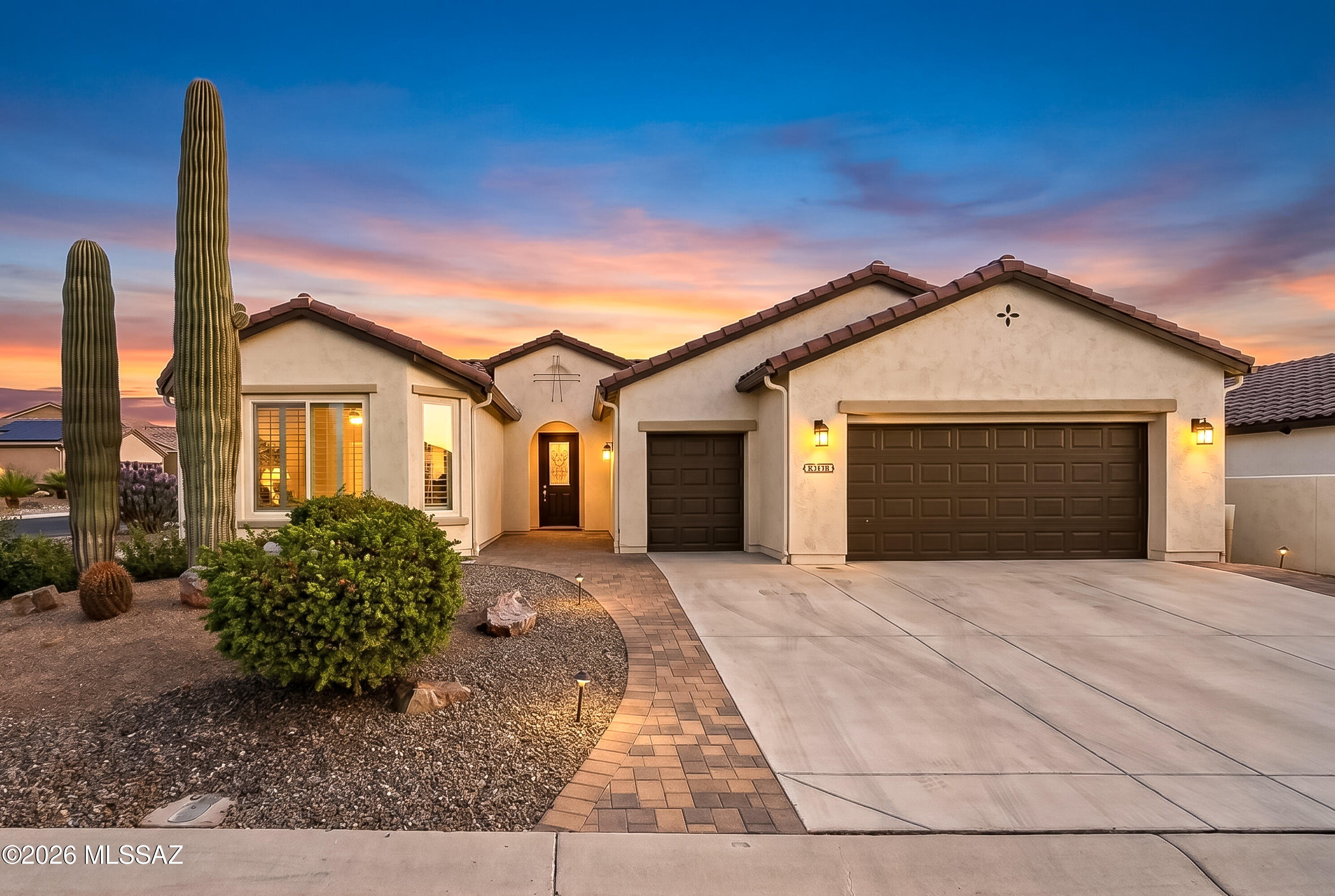 Desert Luxury Meets Resort-Style Living in the Heart of SaddleBrooke Ranch
Welcome to this beautifully upgraded Cortez model tucked away on a desirable cul-de-sac corner lot in the award-winning active adult community of SaddleBrooke Ranch. Freshly painted inside and out, this meticulously maintained home showcases elegant tile flooring throughout -- absolutely no carpet -- creating a clean, sophisticated look that perfectly complements the open-concept design.
Designed for both comfort and entertaining, the spacious layout features sought-after bump-out extensions in both the primary suite and guest suite, offering additional living space and enhanced functionality. The gourmet kitchen is beautifully appointed with granite countertops, abundant cabinetry, and seamless flow into the great room and dining area.
Car enthusiasts and hobby lovers will appreciate the extended two-car garage with an additional four-foot extension, plus the separate third-car golf cart garage -- ideal for extra storage, golf cart parking, or workshop space.
Step outside to your own private desert retreat featuring mature landscaping, a tranquil water feature, and inviting outdoor living spaces perfect for relaxing or entertaining under Arizona's stunning sunsets.
Located just moments from the golf course, clubhouse, fitness center, pickleball, dining, and all the incredible amenities that make SaddleBrooke Ranch one of Southern Arizona's premier luxury 55+ communities, this exceptional home offers the perfect blend of lifestyle, location, and luxury living.