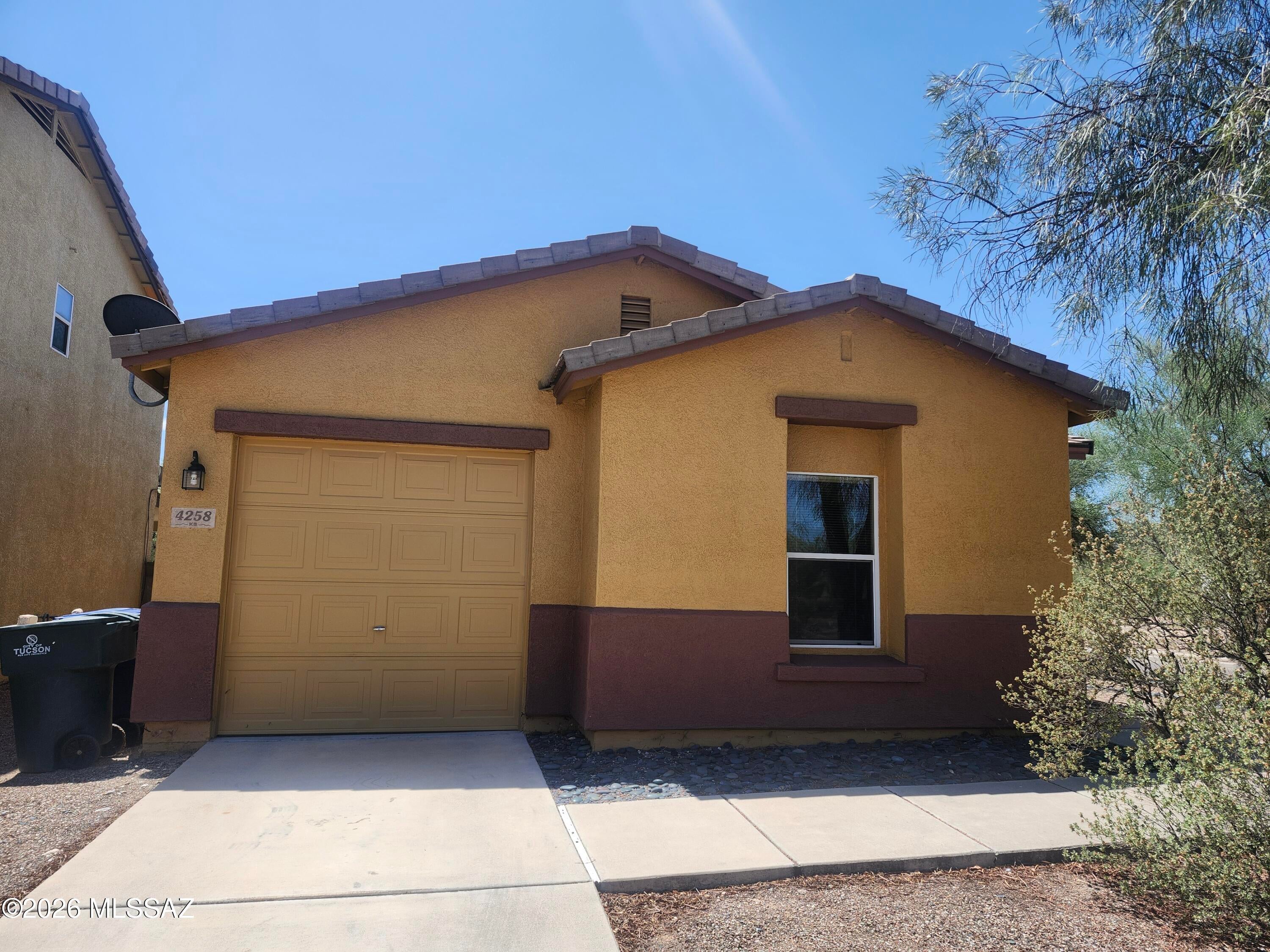 Charming 2-Bedroom Home in Central Tucson! Welcome home to this inviting 2-bedroom, 1-bath home in Riverhaven HOA, offering comfortable living and convenient access to all that Tucson has to offer. This thoughtfully designed floorplan features a neutral color palette, ceiling fans, and a cozy fireplace that creates a warm and welcoming atmosphere. Eat in kitchen with all appliances (including washer and dryer) and access to the back patio, perfect for entertaining. Enjoy the outdoors with a private yard, plus the convenience of a 1-car garage. Located near, shopping, buslines and hospitals, a comfortable home in a convenient location.