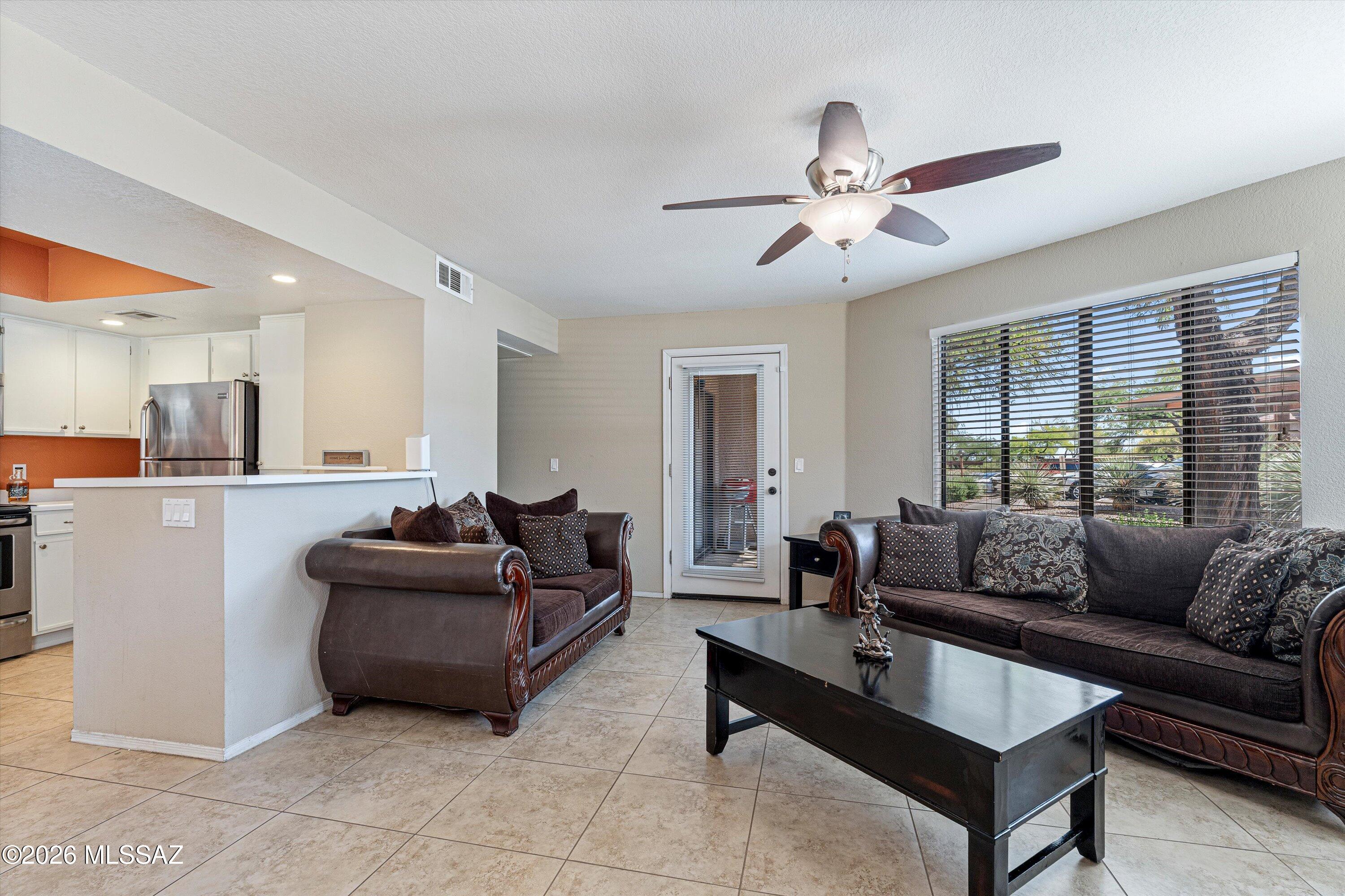 Welcome to this beautifully maintained 2 bedroom, 2 bath condo that offers a spacious great room floor plan perfect for comfortable living and entertaining. Located just minutes from Sabino Canyon. You will enjoy easy access to world-class hiking and biking, as well as dining, shopping, and golf. This gated community features resort-style amenities including a pool and spa, fitness center, and covered parking. Whether you're seeking a full-time residence, seasonal retreat, or investment opportunity, this is your chance to own a piece of the sought-after foothills lifestyle. Don't miss this exceptional opportunity to make this your home!!