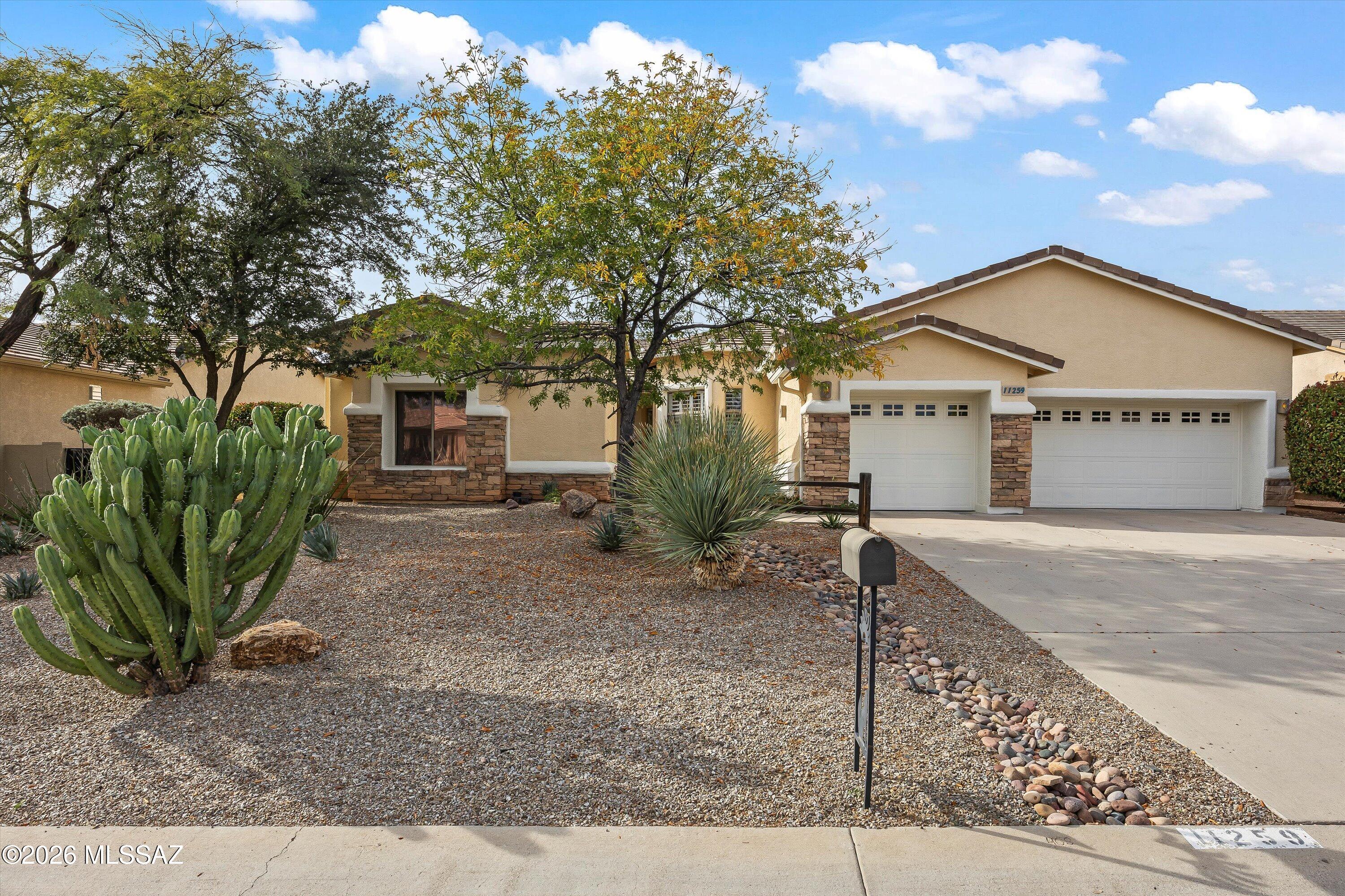 Must-see home in the highly desirable Desert Vista Neighborhood of Oro Valley. This well-maintained single-story residence offers 4 bedrooms, 3 bathrooms and a 3-car garage, along with a thoughtfully designed chefs kitchen ideal for both everyday living and entertaining. The spacious backyard features an oversized patio, creating an inviting space for outdoor enjoyment. The fourth bedroom includes its own private entrance and full bathroom, making it ideal for a home office, guest suite, or studio. The living room is highlighted by a striking stacked-stone fireplace that adds warmth and character. Recent updates include a new roof underlayment in 2025 and a new HVAC system in 2024. Estate Sale.