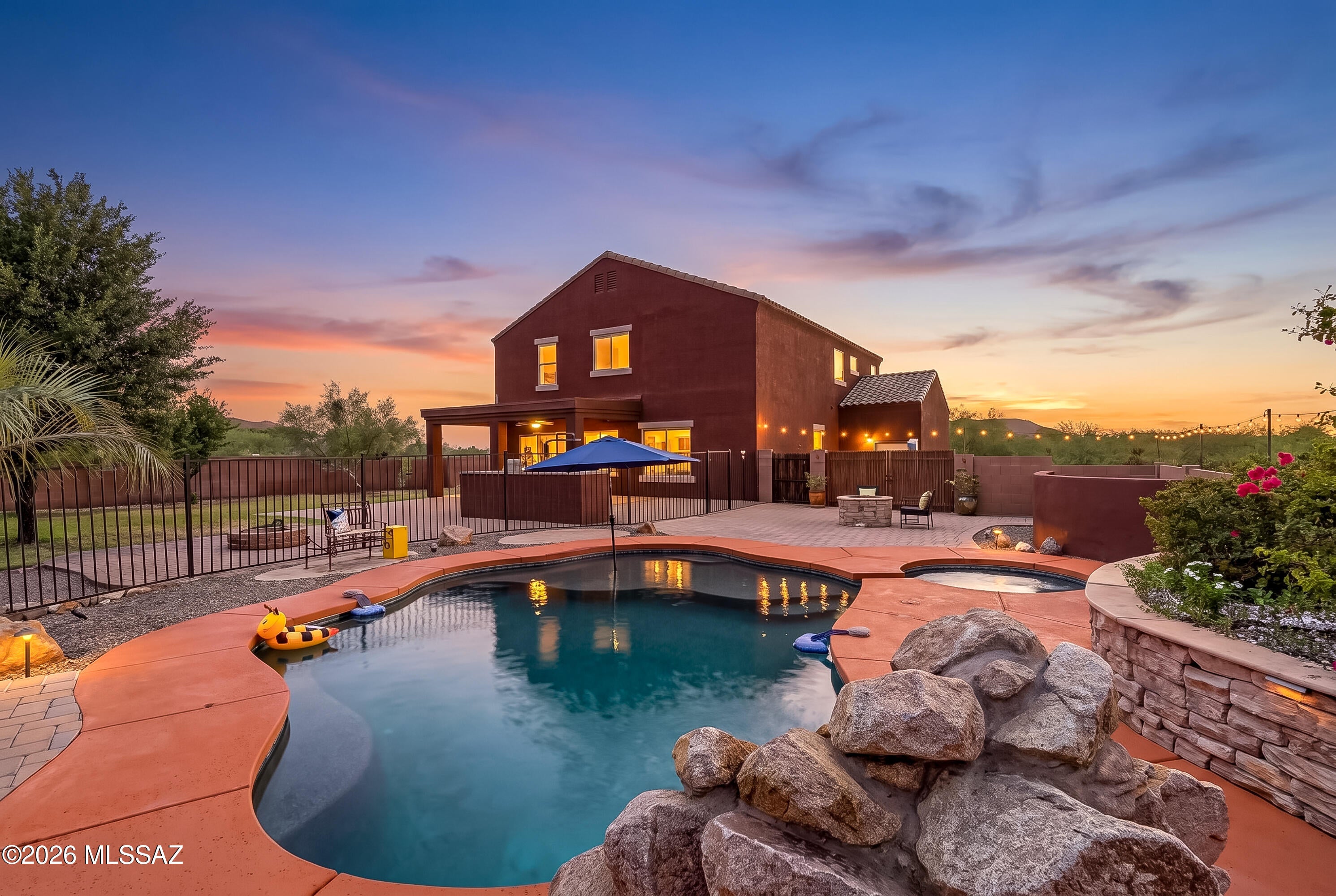 If you've been searching for space, privacy, and the freedom to truly enjoy Arizona living, welcome home.

Nestled on just over an acre in the desirable Sahuarita Highlands, this beautifully maintained four-bedroom, two-and-one-half-bath home offers 2,596 square feet of comfortable living with breathtaking mountain views and the wide open spaces that make Southern Arizona so special.

This is more than just a home. It's a place where your RV has room to park, your off-road toys are ready for the next adventure, and your weekends begin the moment you pull into the driveway. Whether you enjoy exploring the surrounding desert on your ATV, riding dirt bikes, taking your side-by-side out for the day, or simply appreciating the peace and quiet that comes with larger homesites, you'll love - the lifestyle this property offers.

Inside, you'll find a bright and open floor plan designed for both everyday living and entertaining. Natural light fills the home, creating warm and inviting living spaces that make family gatherings and relaxing evenings feel effortless.

At the heart of the home is a beautifully appointed kitchen featuring rich dark cabinetry, granite countertops, stainless steel appliances, a modern chef-style faucet, generous workspace, and a large walk-in pantry that provides exceptional storage. Whether you're preparing dinner after a day on the trails or hosting friends and family, this kitchen is designed to bring everyone together.

The spacious primary suite offers a peaceful retreat at the end of the day, while the additional bedrooms provide flexibility for guests, a home office, hobbies, or a growing family.

Venture outside and discover your own private Arizona retreat.