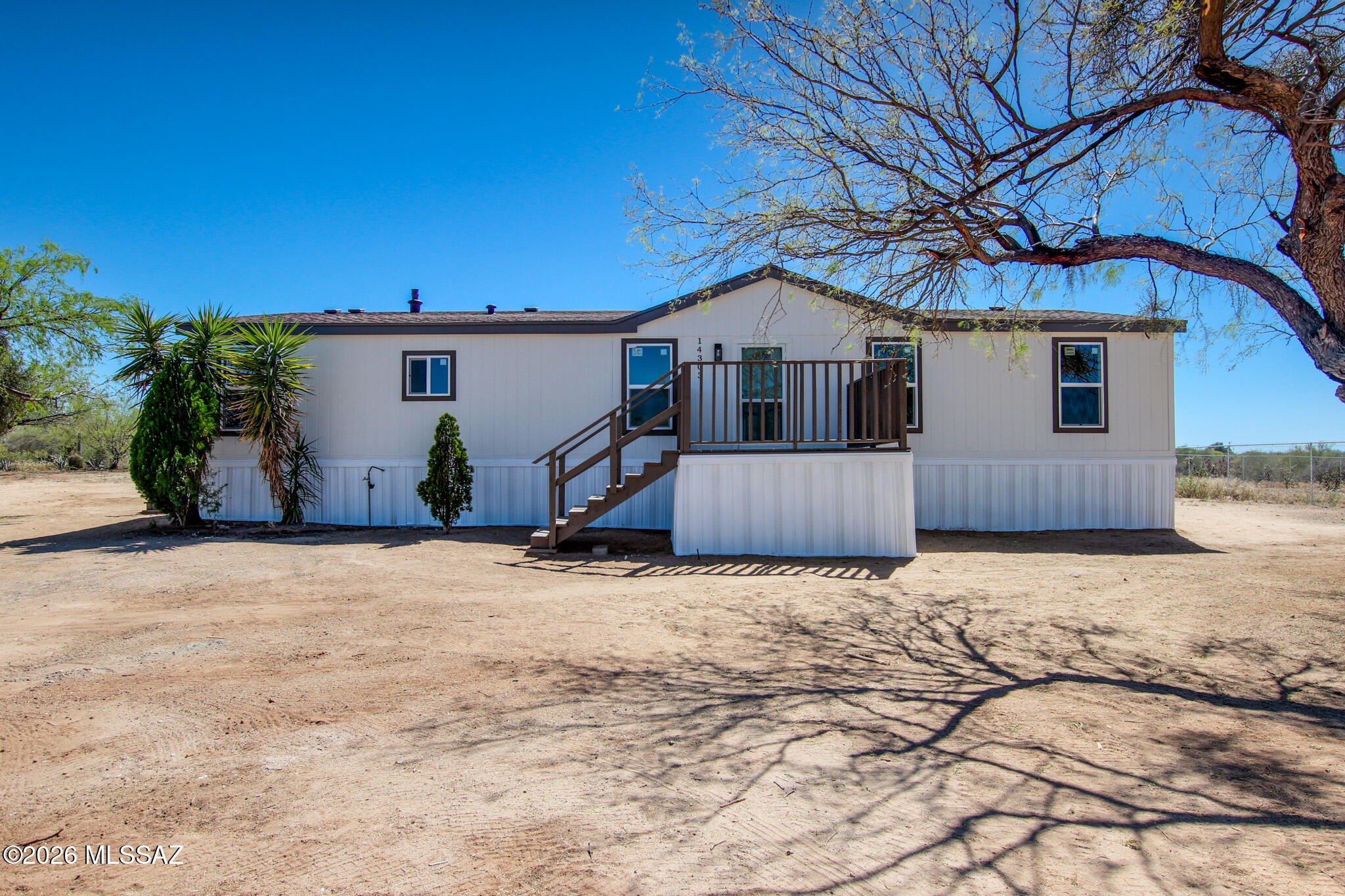 Now Available! Updated manufactured home. Recent upgrades include luxury plank flooring, new carpet, updated electrical fixtures, door hardware, and a brand-new AC.  Kitchen features neutral light brown cabinets, new countertops, and stainless steel appliances. Bathrooms tastefully updated. Primary suite features walk in closet.  Interior and exterior updated with fresh paint. Move-in ready and a must see!