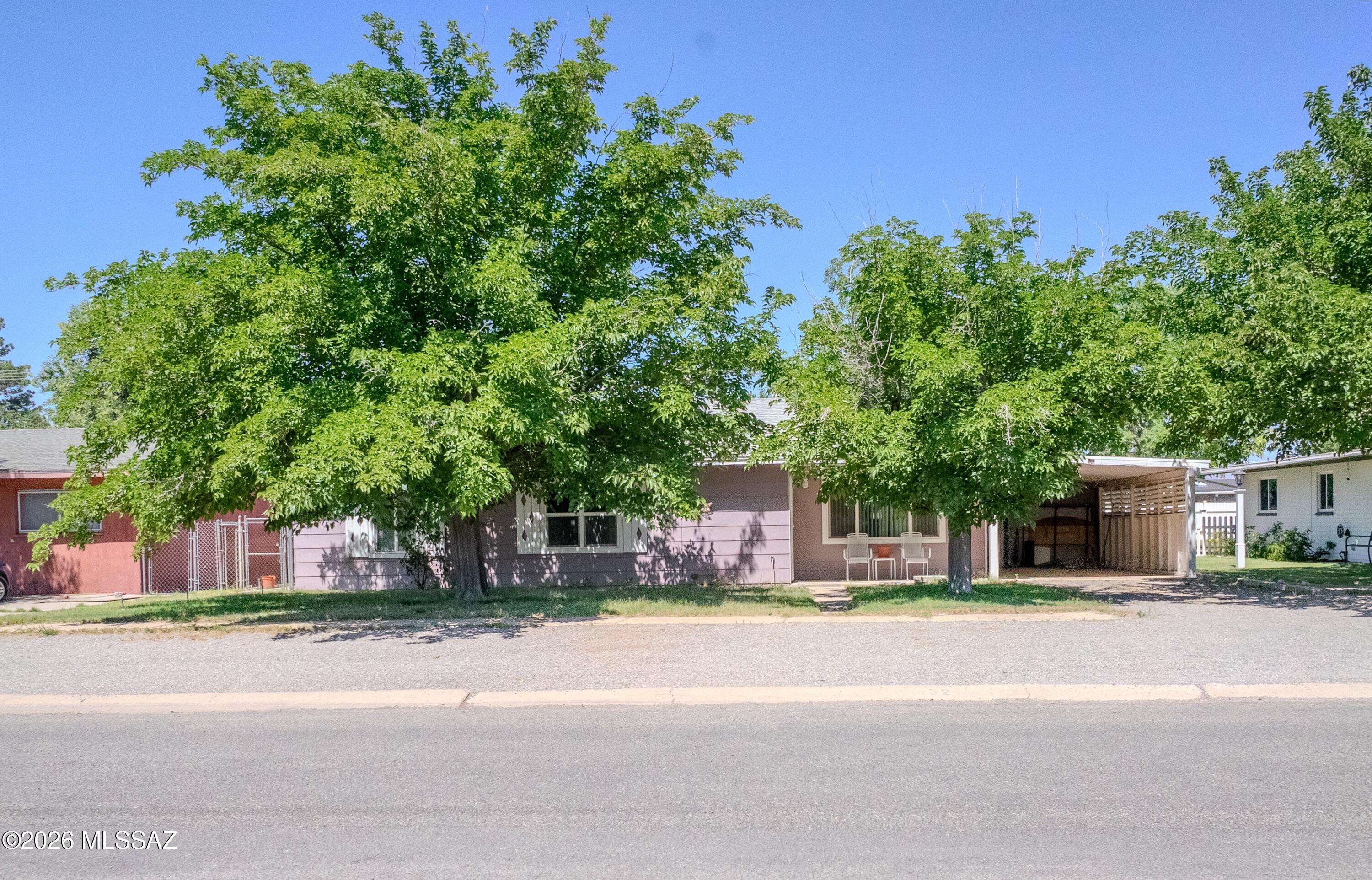 Large family home.  Three bed, two bathrooms. Two living rooms and a workshop/shed/storage out back with private parking.  Backyard has fruit trees and a gazebo.