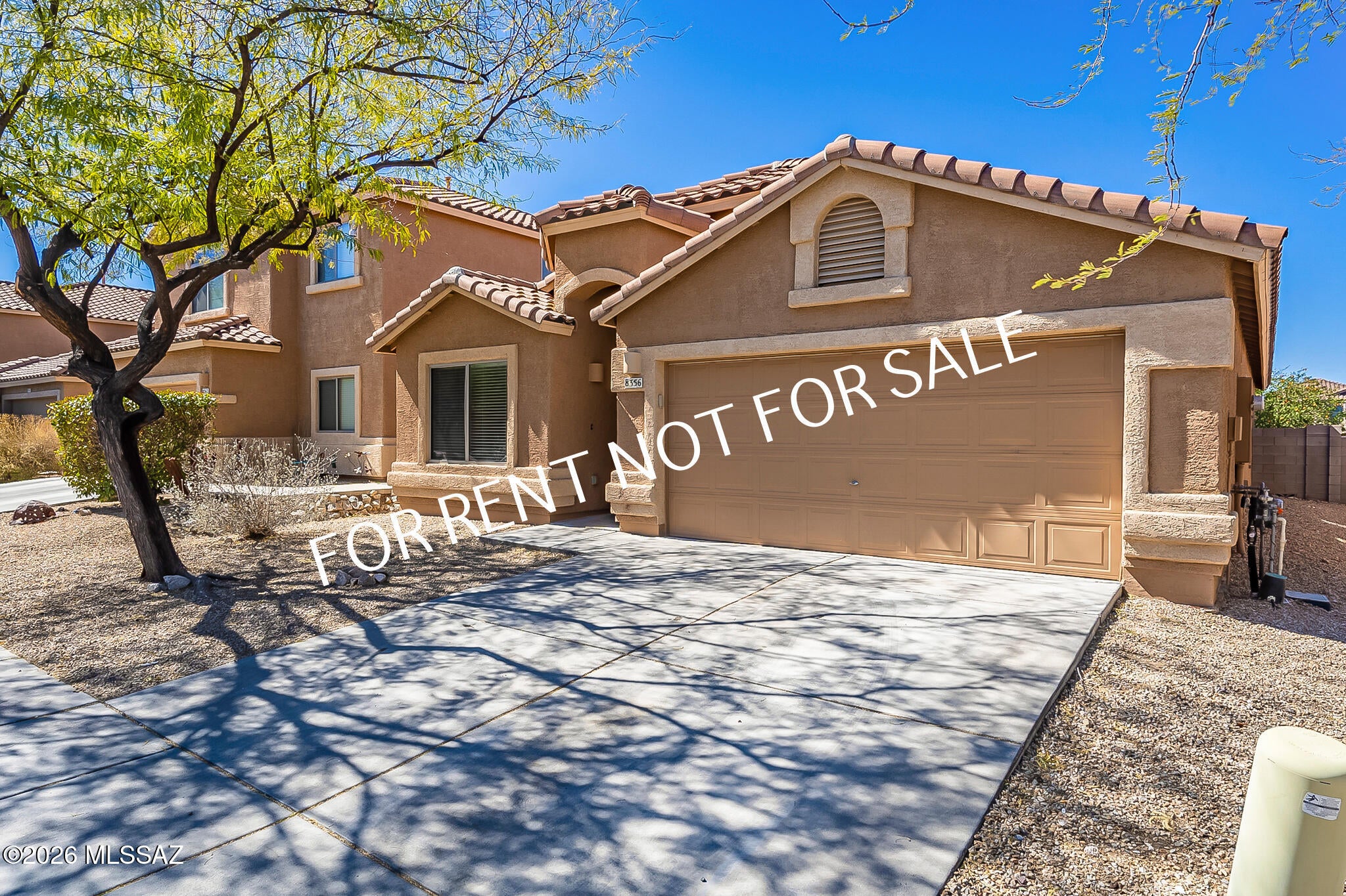 Built 2007 4 BED 2 BATH 1760 SQ.FT inviting home located in the highly favored Rita Ranch Community in Empire Heights Subdivision and the Vail School District. Gorgeous wood laminate and tile throughout entire house and fresh, neutral interior paint,  Great room with dining area and separate living room off the kitchen with a breakfast nook and kitchen island. Appliances included: refrigerator, gas stove, built-in microwave, dishwasher, washer/dryer. The spacious bedrooms provide plenty of room, while the Jack-and-Jill bathroom offers functionality for the secondary bedrooms. The large primary suite features double-door entry, a generous primary bathroom, and a walk-in closet. Pets are subject to approval. **Please visit our website for SECURITY DEPOSIT AMOUNT AND OTHER FEES.*