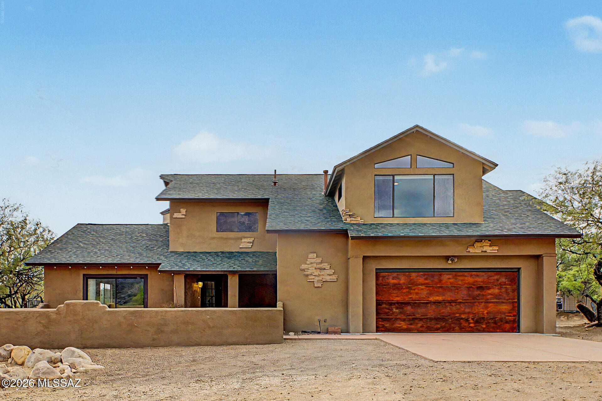 Seller will accept or counter offers between $975,000 and $999,000. FOREVER VIEWS • GUEST QUARTERS • POOL • WORKSHOP • HORSE PROPERTY • RV SPACE • NO HOA Experience unparalleled access to the outdoors with this one-of-a-kind 5-bedroom, 4.5-bath, 4,084 sq. ft. custom home on nearly one acre, directly bordering State Land and the Coronado National Forest. A private back gate opens to thousands of acres of protected wilderness, allowing hiking, horseback riding, mountain biking, and exploration right from your property. Enjoy breathtaking, unobstructed views of Mt. Lemmon from nearly every room. Designed to embrace its spectacular setting, the home combines spacious living areas with exceptional functionality. The main level features a spacious living room with large sliding doors the mountain views and seamlessly connect indoor and outdoor living is equally impressive with a pool, oversized covered patio, fire pit, shaded ramada, mature desert vegetation, natural boulder accents, and endless mountain views. Additional amenities include a large workshop, covered 30-foot RV parking, and ample room for horse facilities with direct ride-out access into the national forest.
Located just minutes from town and near Miraval Arizona Resort & Spa, this rare property offers the perfect blend of privacy, breathtaking scenery, direct wilderness access, and a lifestyle designed for those who appreciate both adventure and comfort.
A truly unique opportunity where forever views, exceptional versatility, and direct access to the Coronado National Forest come together in one remarkable property.
