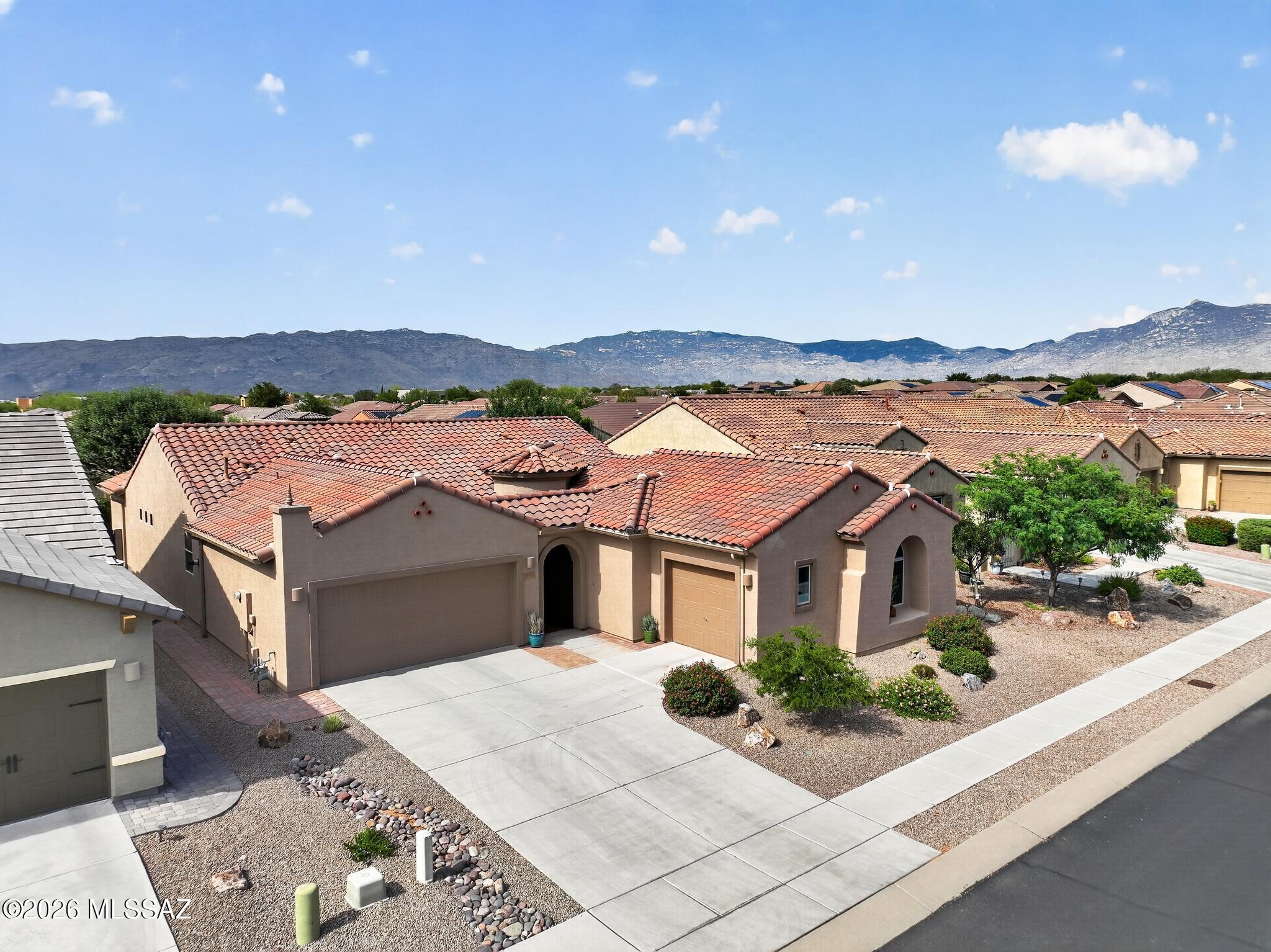 Wonderful original owner 2BR+2 bonus rooms, 2.5BA in active adult community of Del Webb at Rancho del Lago w/large 3 car epoxy floor garage & lots of storage. Mostly staggered tile in this beautiful Celebration floorplan. Gourmet kitchen w/granite counters, marble backsplash, huge pantry, cabinet pullouts, & pendant lighting. Large great room w/built in entertainment ctr. Primary BR has plenty of room for a sitting area. Primary Bath has walk in shower, solar tube & spacious closet. Guest BR w/ensuite full bath. Water softener w/Reverse Osmosis filtering system. Rain gutters though out. Interior & Exterior of home painted in the last few years. Beautifully landscaped north facing back patio w/nice mature shade trees. Home is located on a quiet low traffic street. Very Nice !!