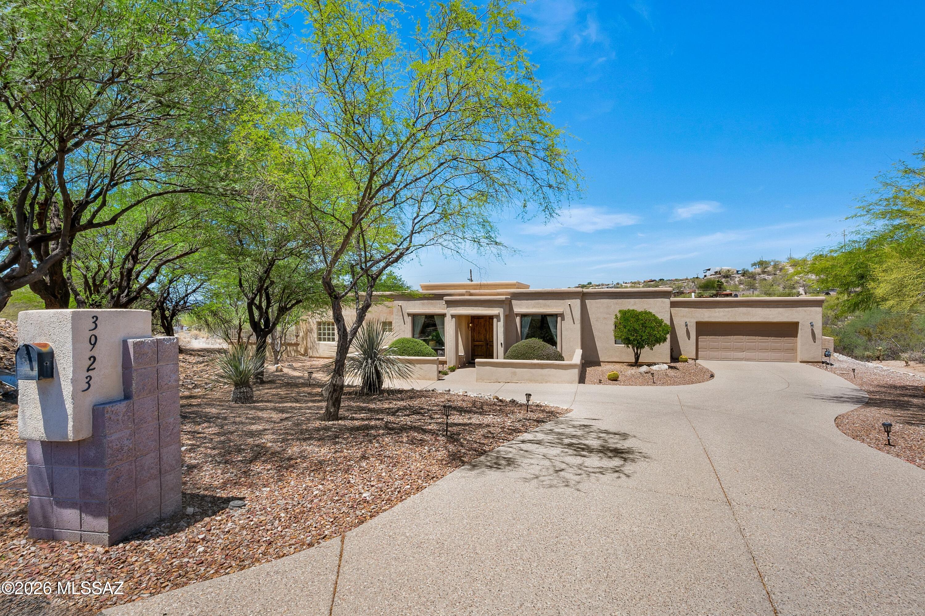 Located in the gated enclave of River Heights Estates, this spacious residence offers an exceptional opportunity to create your dream home in one of Tucson's desirable foothills communities. Priced to sell and offering more than 2,800 square feet, this 4-bedroom, 2.5-bath home features a thoughtful split-bedroom floorplan with expansive living spaces and outstanding potential for added value. The heart of the home is a generous family room adjoining the eat-in kitchen with a charming dining nook, while separate formal living/library and dining rooms provide flexibility for entertaining or quiet retreat spaces. The split-bedroom floorplan offers exceptional privacy, with the spacious primary suite tucked away on its own wing of the home, featuring a large bath with a separate tub(continued) and shower, an oversized vanity area, and abundant closet storage.  Additionally, two generously sized secondary bedrooms are positioned together with a shared bath and convenient dual vanity area, while a 3rd guest bedroom is privately situated near the laundry and garage area, ideal for visitors, multigenerational living, or a quiet home office setup. Thoughtfully designed for Arizona indoor-outdoor living, the powder room features direct exterior access to the backyard, creating the perfect setup for a future pool and entertaining space. A large laundry room with additional storage leads to the oversized garage, complete with an enclosed workshop space, perfect for hobbies, storage, or future conversion into a private office or studio with the addition of a mini-split system. Recent updates include upgraded flooring and kitchen countertops, while some finishing details remain--allowing the next owner to personalize and elevate the home to its full potential. A true diamond in the rough, this property presents a rare chance to build instant equity with a little vision and finishing work in a premier Tucson location.