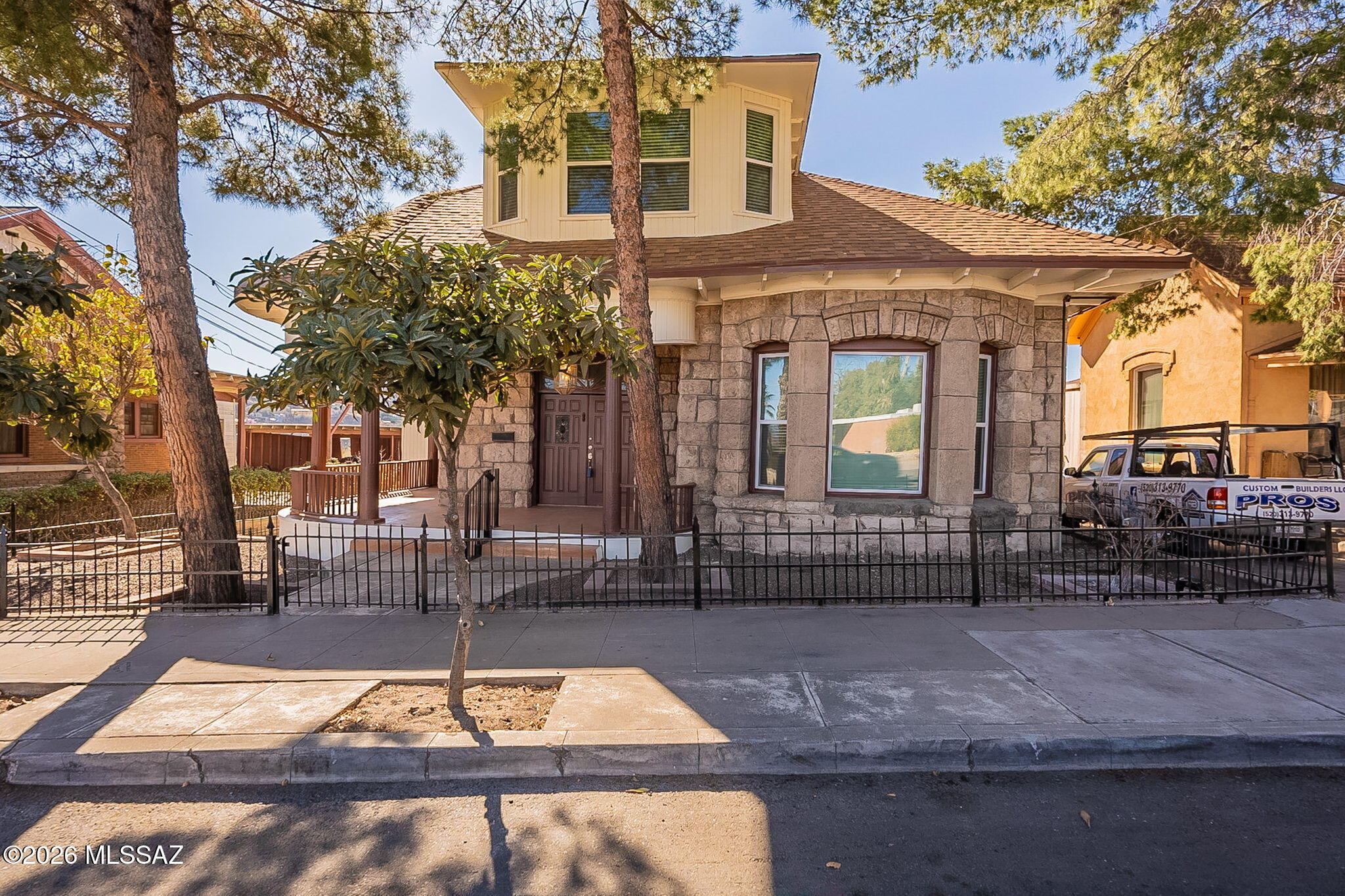 Back on market, buyer's credit was declined. This is the historic former home of  Raul Castro, the first Mexican-American Governor of Arizona. Fully remodeled with new new paint, carpet, LVP flooring, bathrooms, kitchen, roof, HVAC, etc. Enjoy a beautiful view of Mexico, looking out over the border. The home is currently hosting short-term Airbnb guests, with consistently full occupancy. 4 en-suite bedrooms each feature their own full bathrooms.  Suitable for multi-generational families. And there's a bonus apartment with a kitchenette, perfect for a caretaker or additional rental income.