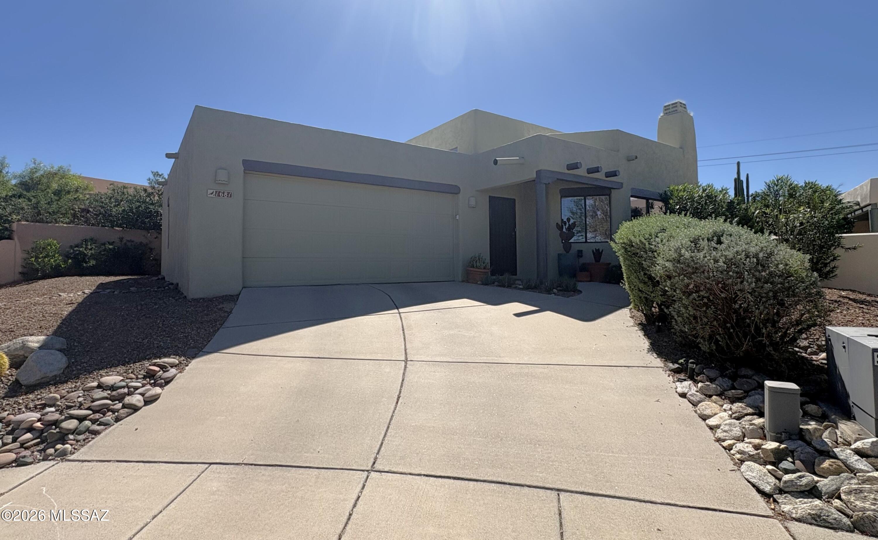 Experience comfort and style in this beautifully updated 2 bed, 2 bath cul-de-sac home with a spacious 2-car garage. All-tile flooring, ceiling fans throughout, and a bright open layout lead to a large private yard with a covered patio. Enjoy a community pool & spa, plus a park right across the street. Modern, low-maintenance living in a prime location.