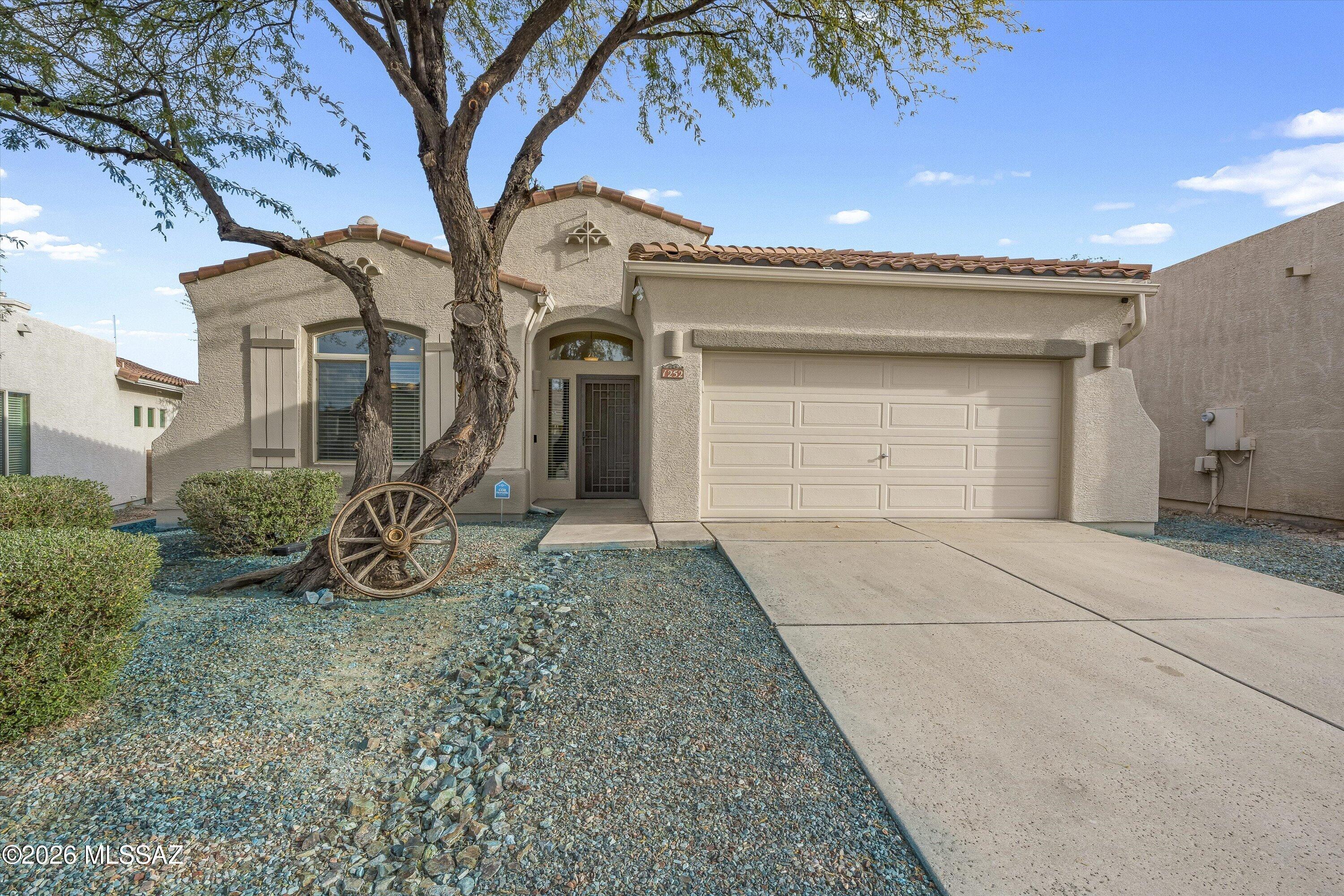 Welcome to this beautiful 3 bedroom, 2 bathroom east side home located located in the Spanish Trail Subdivision near shopping, schools, and the Northwest Medical Center. From the moment you walk in, you notice the beautiful new flooring, high ceilings, and the open floor plan. Your eyes enlarge as soon as you step into the spacious living room, where natural light streams in through the windows, making the room feel warm and inviting. The soft, fresh colors on the walls create a cozy atmosphere, perfect for family gatherings or quiet evenings at home. As you move into the kitchen, you can imagine cooking delicious meals, surrounded by new modern appliances and ample counter space. With beautiful new granite counter tops and backsplash, makes this modern kitchen a must have. The dining area flows seamlessly into the living room, making it easy to entertain friends or enjoy a mea ones. With three comfy bedrooms, everyone has their own space to relax and recharge, while the two bathrooms ensure that morning routines run smoothly. This home is not just a place to live; it's a place to create memories and enjoy life.