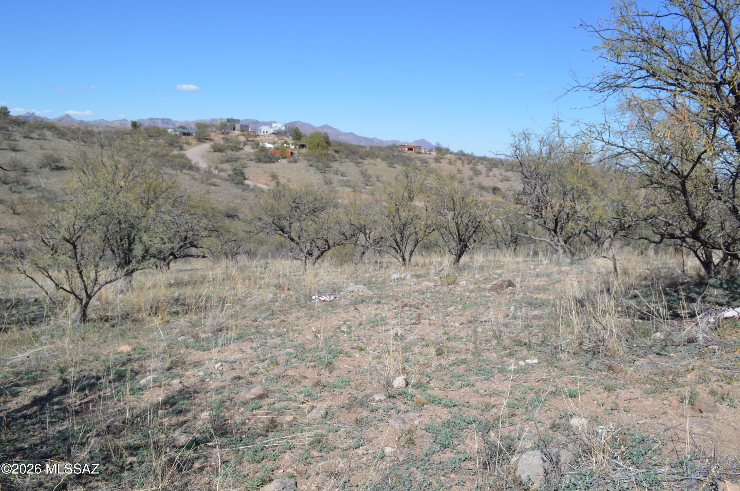 1.5 Acres for SALE! This lot is adjacent to state land making it extra private in the back, very spacious, and offers a fresh start. The land is a desirable building site, with a gentle slope. There is a view of the sunset in the evenings and night time lights from homes across the rolling hills. Nearby paved street, on a short dirt road and less than 10 minutes from the freeway. Come see the possibilities! Call agent for directions to the property.