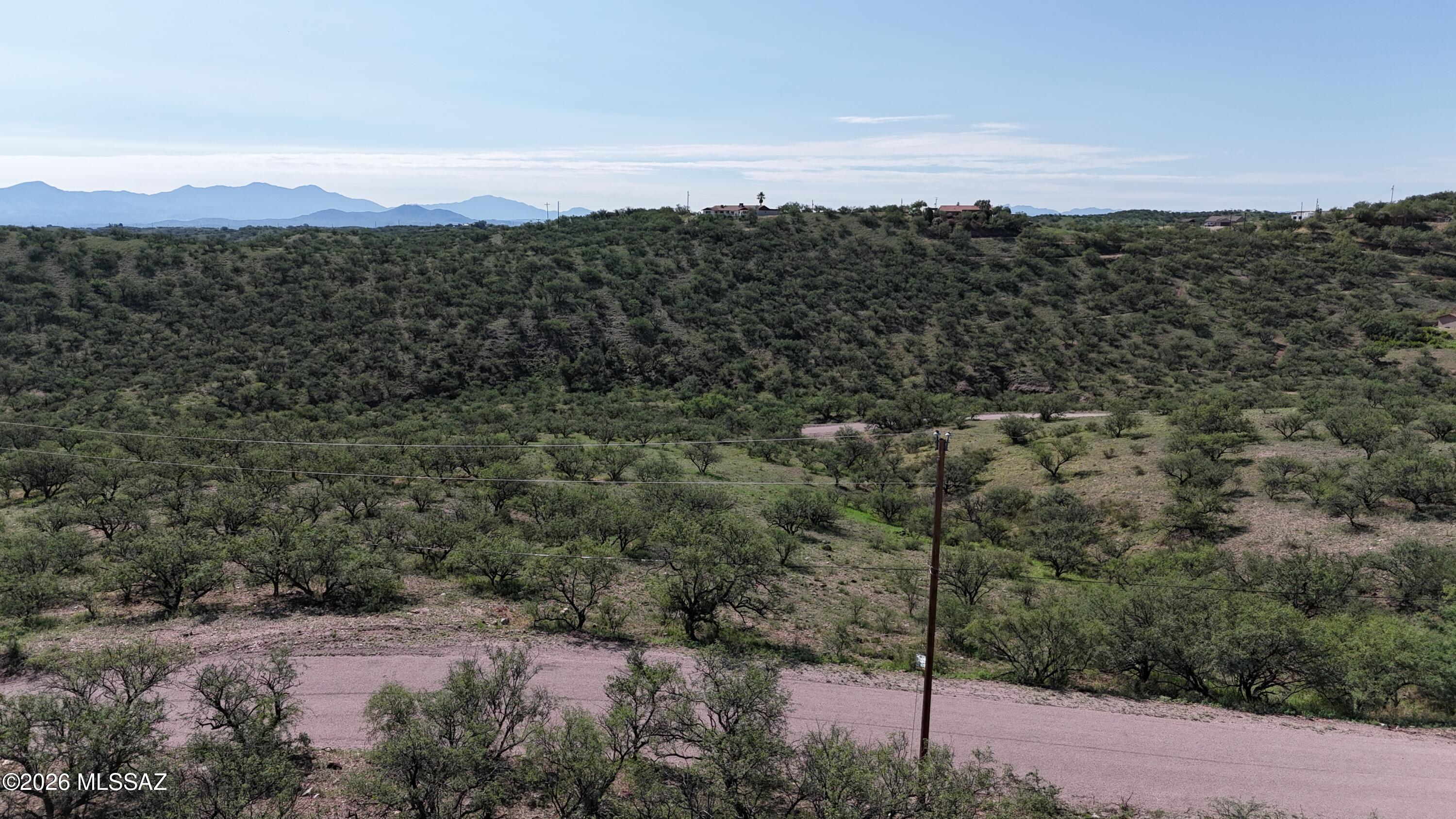 Nice residential lot in popular area due to it's beautiful views.  All paved access, electric and water are along Camino Kansas.