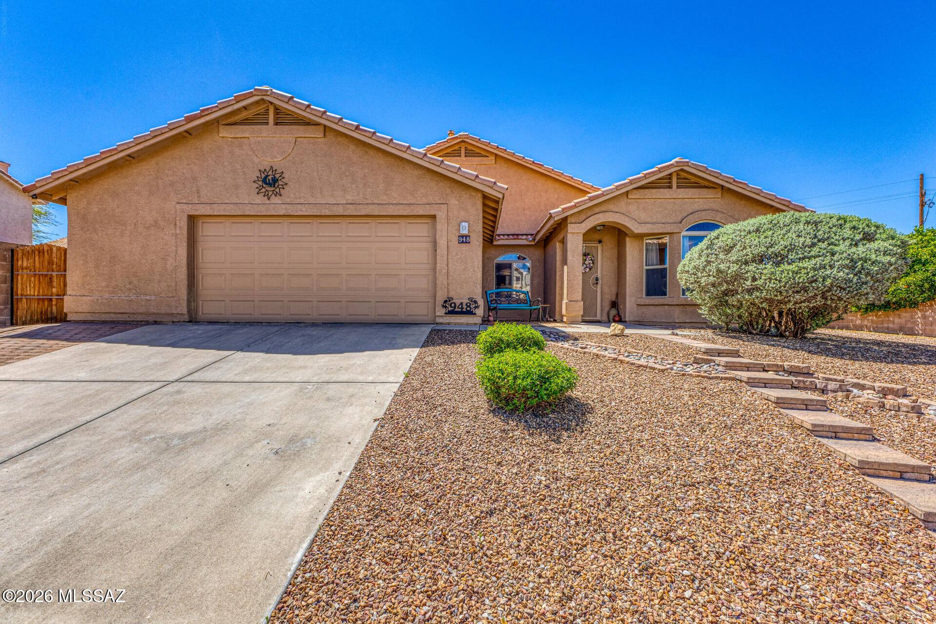 Beautiful, well maintained home in a desirable East side neighborhood. Arguably the best lot in the community with a huge very private backyard. Desert walking trail with beautiful mountain views just steps away at the end of the cul-de-sac. Mature landscaping and roomy patio compliment the sparkling pool. Home feels open and airy with vaulted ceilings and a Family Room that opens to the Kitchen. 3 BR with a den (can easily be a 4th BR) Beautiful and functional Kitchen includes an island, upgraded appliances, Corian countertops and extra cabinet space. Huge 2.5 car garage give you plenty of room for your extra stuff and/or toys! The home is situated near the end of the cul-de-sac giving you extra privacy and very little traffic. Come see this beautiful home today, this one wont last!