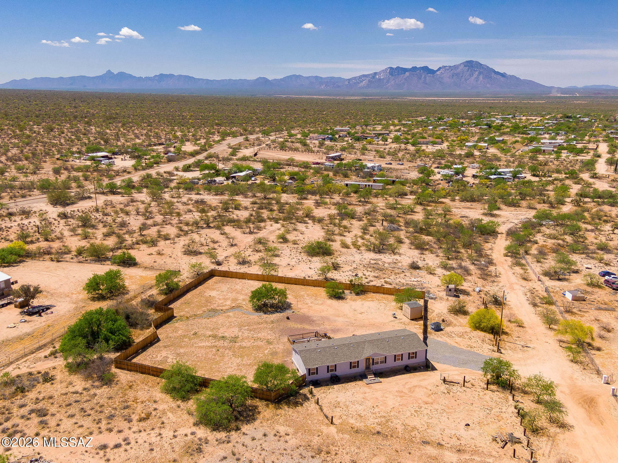 Panoramic mountain, desert and sunset views with this spacious 3 bed, 2 bath split floor plan. Open kitchen boasts stainless steel/black appliances, pantry, island and an abundance of cabinets. Generous sized bedrooms with the primary offering walk-in closet, ensuite with separate shower, jetted tub and dual vanities. Huge great room, dining area plus a good size laundry room/storage area. Multi level rear deck takes you to the nearly 1 acre fenced back yard which includes a shed. Plenty of room for entertaining, RV parking and all your toys. Get out of the city and enjoy the space and peace this property offers...come make this beautiful house your home today!