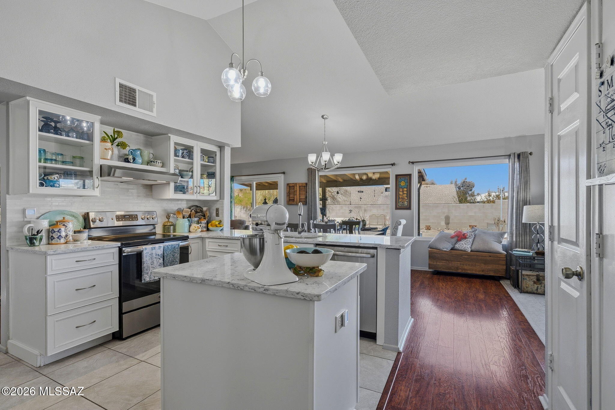 Perfectly positioned on a premium oversized corner lot, this beautiful single level home reflects exceptional pride of home ownership. This well-maintained 4-bedroom home offers an increasingly rare combination: no HOA, expansive yard space, mountain views, and major capital improvements already completed -- including a brand-new roof, updated HVAC and many updates throughout the home. Inside, vaulted ceilings and abundant natural light create immediate volume and openness. The great-room floor plan flows seamlessly between living, dining, and family room areas, anchored by a wood-burning fireplace that adds warmth and character. The kitchen has been thoughtfully remodeled with beautiful granite countertops and stainless appliances. Other updates include the bathrooms, windows and much mor Thoughtfully designed for seamless indoor-outdoor living, the oversized covered patio extends your living space into the outdoors. The expansive backyard is a true differentiator, capturing west-facing views of Sombrero Peak and eastern views toward Pusch Ridge. With ample room to add a pool, casita, RV access, or craft a custom outdoor entertaining retreat, the possibilities are wide open -- all without HOA restrictions.

Located just minutes from Tucson Premium Outlets, Twin Peaks dining, and Upper Oro Valley amenities, the home delivers exceptional convenience while maintaining privacy, space, and views.

Single-level living. Oversized parcel. Capital improvements complete. Mountain views. No HOA.