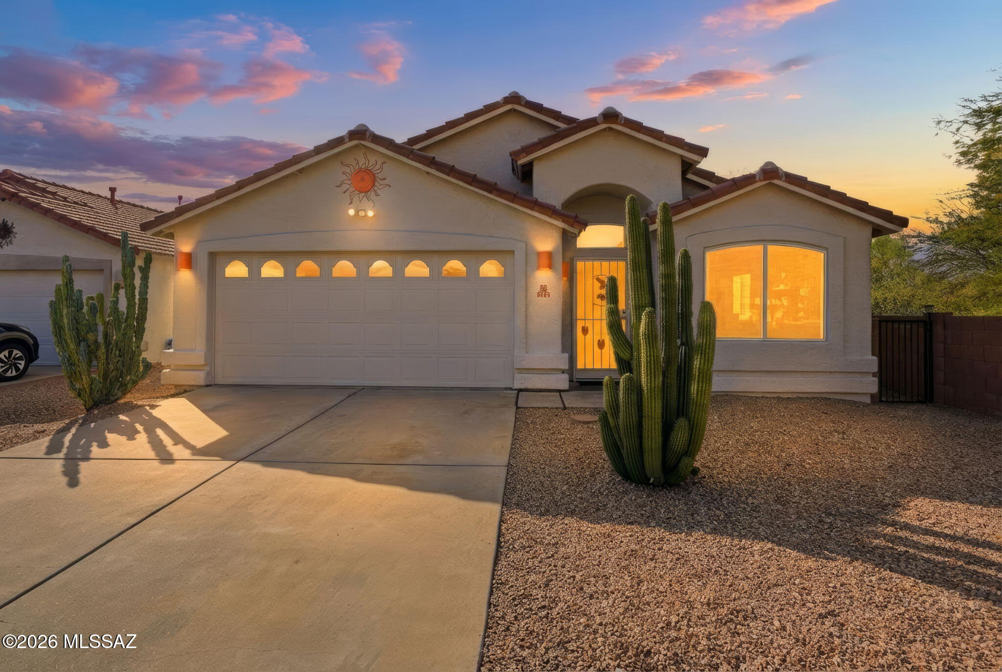 Move in ready home located on a quiet cul-de-sac in desirable Oro Valley. Recent updates include fresh interior and exterior paint, new windows and updated flooring. The kitchen features granite countertops, tile backsplash, and stainless appliances. The primary bathroom includes a jacuzzi tub. Enjoy the covered back porch with decorative-coated concrete, ideal for entertaining. Conveniently located near shopping, outdoor recreation, and state parks.