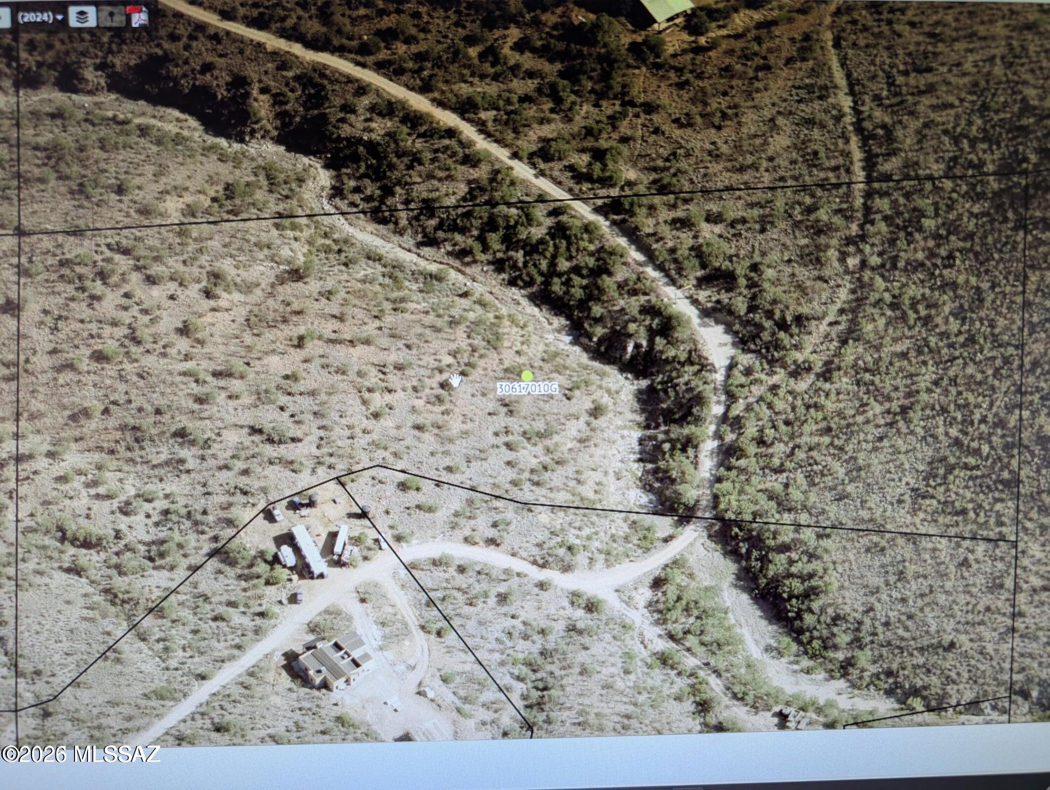 This unique property offers the potential to be divided into two separate parcels, providing flexibility for future development or investment opportunities. Enjoy breathtaking mountain views and the beauty of the surrounding natural desert landscape. With its secluded setting, the property delivers exceptional privacy and an off-the-grid lifestyle while still remaining conveniently accessible. Located just 15 minutes from the I-10 Freeway/Sonoita Highway exit, you'll have the perfect balance of peaceful desert living and easy access to nearby amenities. Be sure to watch the drone footage to fully appreciate the property's stunning views, expansive terrain, and remarkable surroundings.