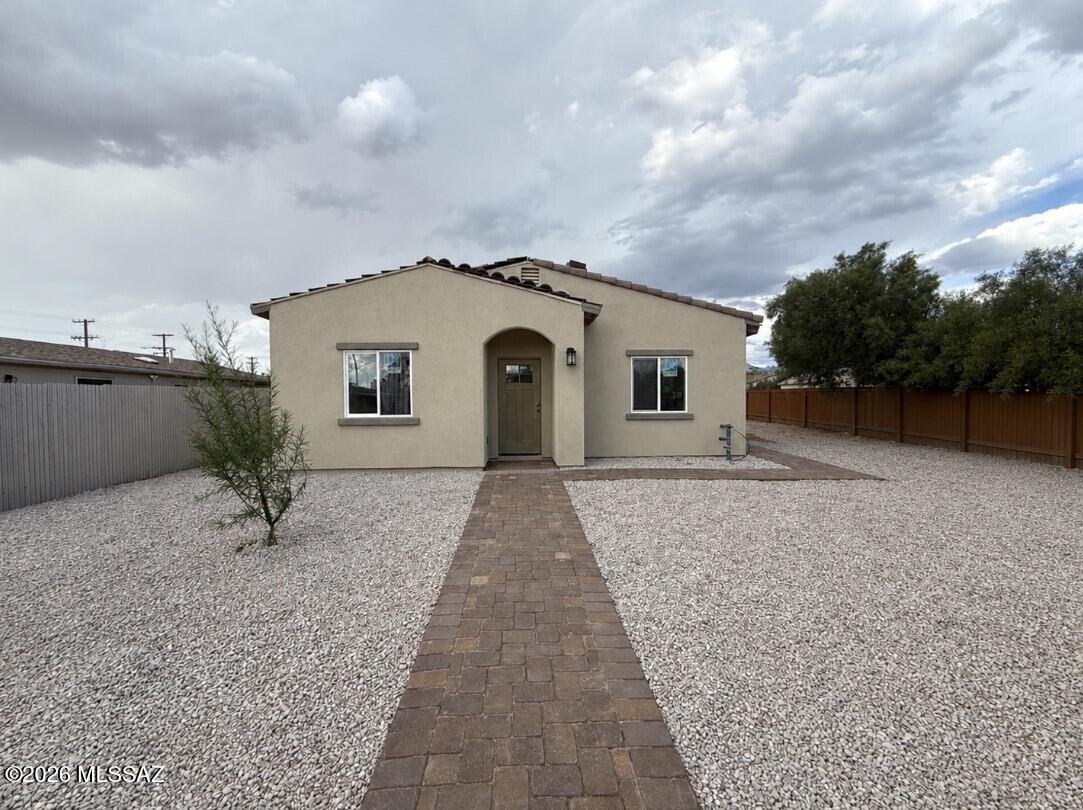 0% DOWN PAYMENT FINANCING MAY BE AVAILABLE FOR QUALIFIED BUYERS! Brand-new 2026 construction featuring an open-concept floor plan, beautiful modern finishes, tile flooring throughout, tile showers, and a tile roof. Includes brand-new refrigerator, stove, microwave, and dishwasher. Enjoy added privacy with a fully metal-fenced yard and NO HOA! A great opportunity for first-time homebuyers or investors looking to grow their portfolio. Schedule your showing today! *Home scheduled to be complete at the end of October*