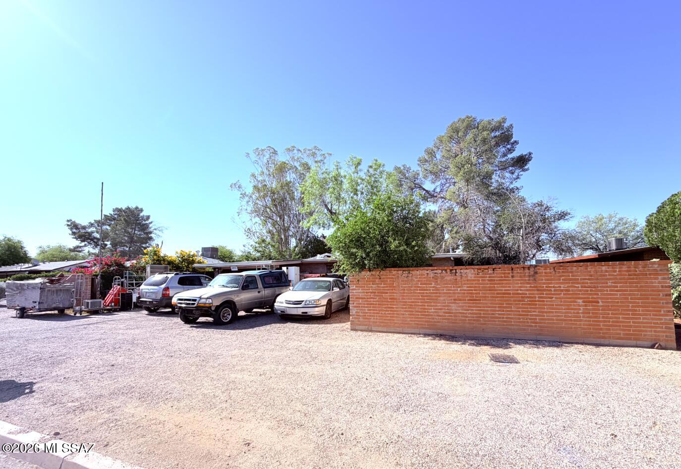 Charming 4 Bedroom home in need of a full makeover but centrally located steps away from La Madera park, restaurants, shopping and UofA!  Please refer to the Agents Remarks section for more information about this opportunity!