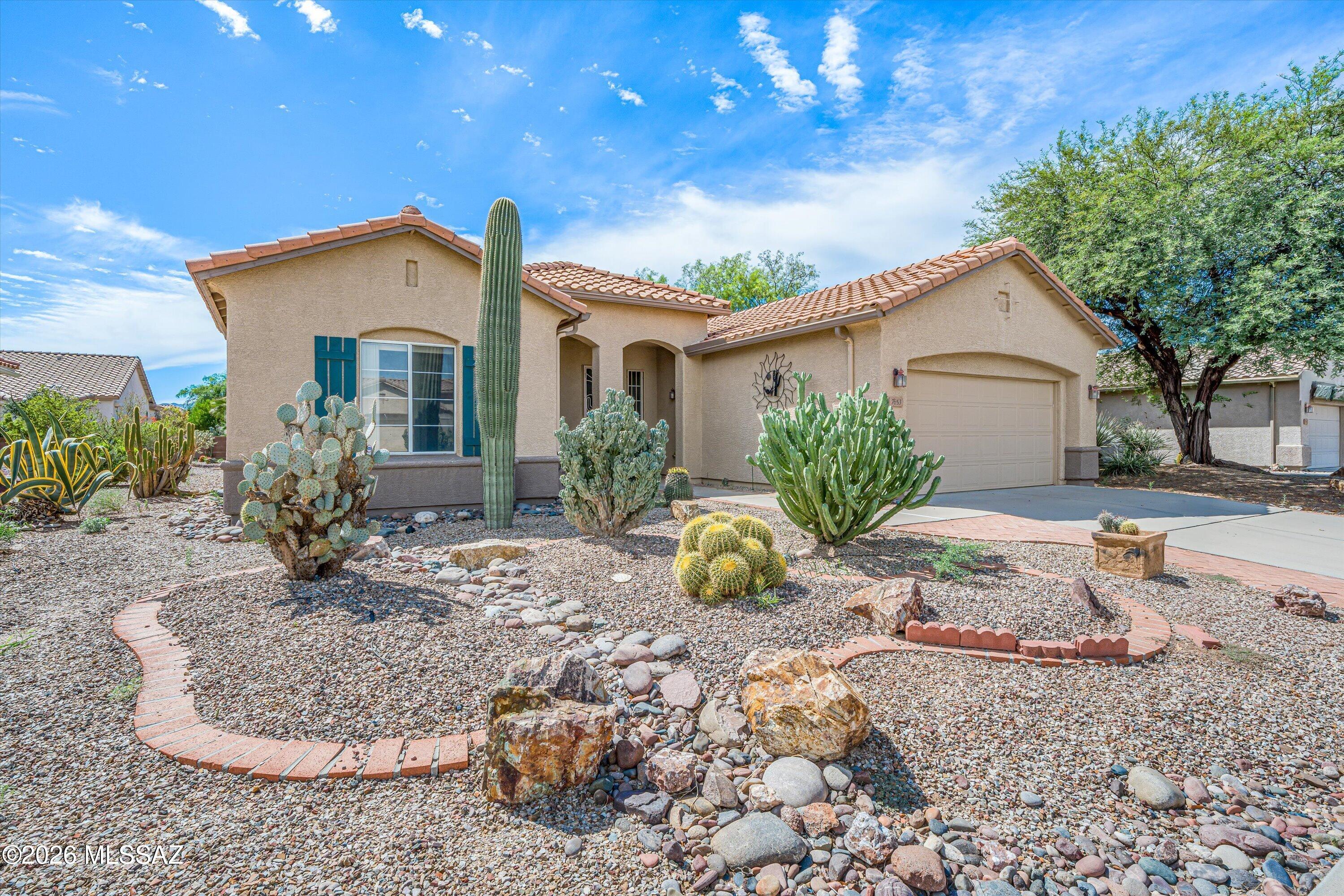 Discover this charming 1,760 sq. ft. home in the sought-after 55+ Continental Ranch Sunflower community. The spacious living room extends to a covered porch for extra relaxation. This San Gabriel floor plan offers flexibility, allowing the living room to include a dining area with a hutch inset and a pass-through to the kitchen, or to create a dining nook off the combined kitchen/family room, which embraces an open setting for meals and conversations (See floor plan). The primary bedroom includes a bay window overlooking the mature desert plants in the backyard. Overnight guests will enjoy their own private hallway and bath. Updates include a new heating/cooling system, freshly painted living room, and carpet throughout.