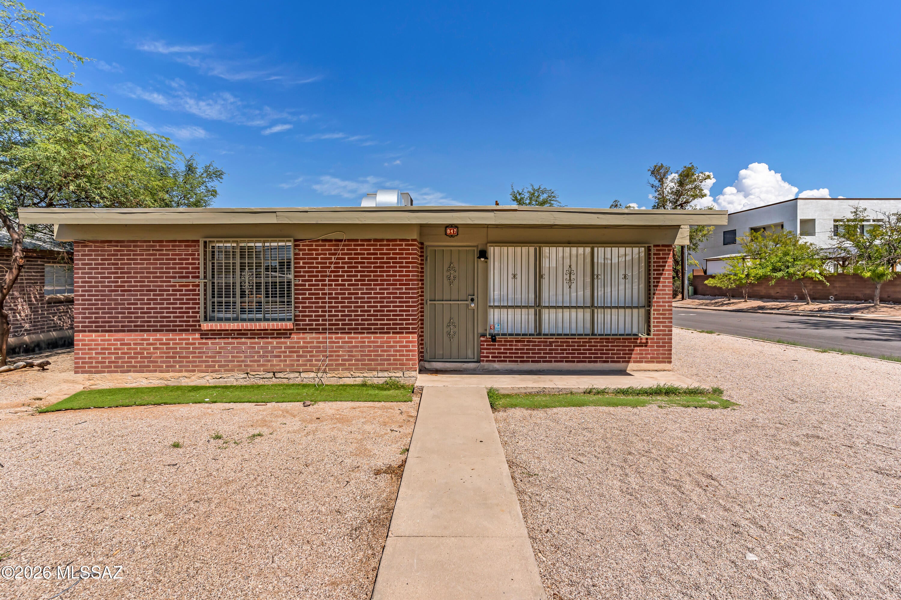Charming central Tucson home with excellent proximity to the University of Arizona, Banner Medical Center, shopping, dining, and downtown. The property features a new water heater, new carpet, a fresh coat of paint and new flooring, plus a newer AC unit and roof. Situated on an NR-2 zoned lot, the property may offer potential for an ADU or additional residential use, subject to City of Tucson requirements and approval. A great opportunity for an owner-occupant, investor, or anyone looking for future flexibility in a highly convenient location.