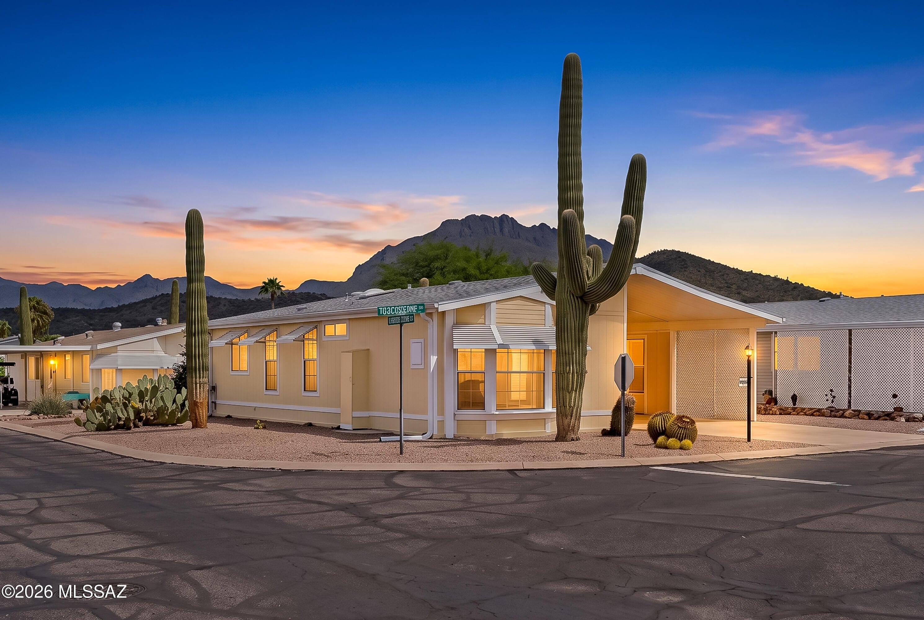 Enjoying the peaceful desert surroundings and beautiful mountain views. Located in the welcoming Copper Crest community. The home is clean, well kept, and inviting, with an Arizona room providing additional space to relax. The property also offers a covered carport, extra storage, a workshop, and low-maintenance landscaping, giving you more time to enjoy the things you love. Copper Crest offers an active community lifestyle with amenities including a swimming pool, recreation center, putting green, shuffleboard, and other opportunities to stay active and social. With mountain views and a low-maintenance setting, this home offers an opportunity to enjoy the best of the Arizona lifestyle. Come experience for yourself why so many are proud to call this community home.
