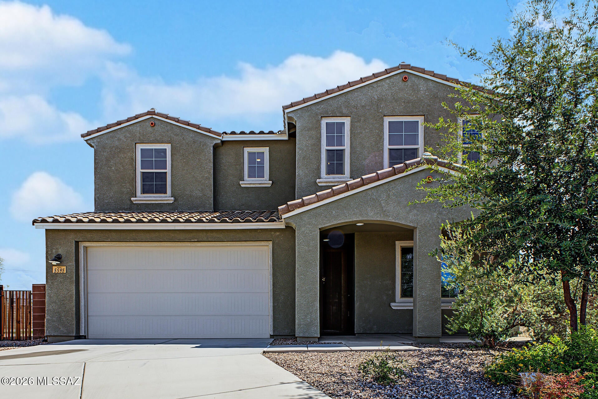 RANGE PRICING $540,000-$580,000! Seller will accept or counter offers within the range. ASSUMABLE 3.25% VA LOAN OPPORTUNITY, subject to lender approval! Beautifully upgraded 2020-built home in the sought-after Vail School District, zoned for Mica Mountain High School. Features include 8-ft black interior doors, private office with glass French doors and a 15-ft multi-slide door for seamless indoor/outdoor living. The kitchen offers granite countertops, walk-in pantry and touch-sensor faucet. Split floor plan includes a spacious primary suite with rain shower and dual vanities. Enjoy a 30-ft covered patio, Sundance Hamilton Spa, professional landscaping and pet-friendly AstroTurf. Exceptional upgrades, flexible pricing and an incredible financing opportunity! Nestled on a lot with room for a pool, you're just minutes from Saguaro National Park, Fantasy Island trails, and Davis-Monthan AFB. A 3-car tandem garage and community pool/parks complete this rare find. Welcome home!
