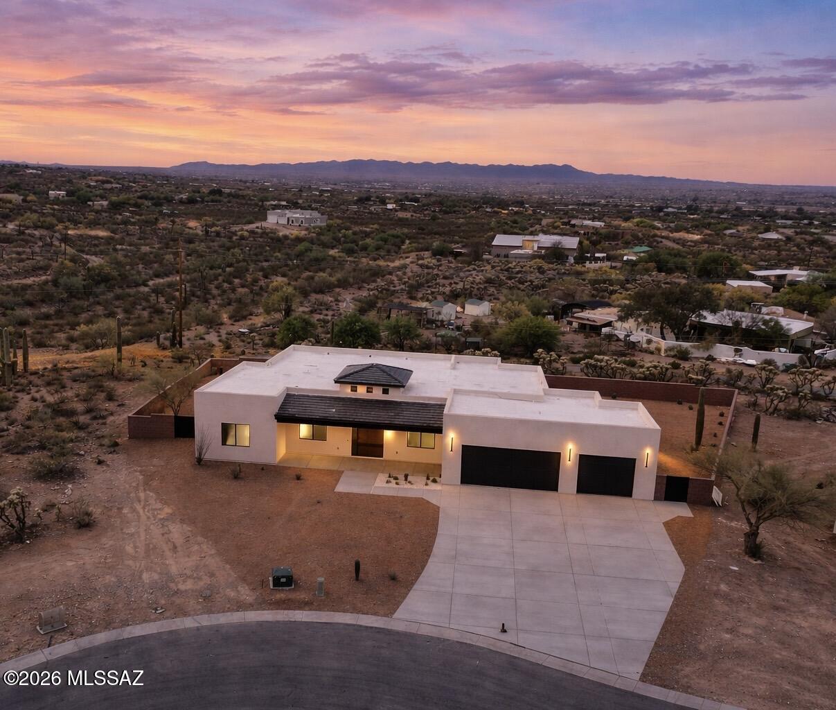 Desert modern property set on a premier view lot with sweeping city light and mountain views. Designed with intention, this residence showcases clean lines. The open great room centers around a sleek chef's kitchen, creating a refined space for both everyday living and entertaining. Step outside to a beautifully finished backyard featuring low-maintenance landscaping, artificial turf, paver and an oversized covered patio perfect for enjoying Arizona sunsets.
Located in a quiet setting while still being conveniently close to shopping, dining, hiking, and amenities.