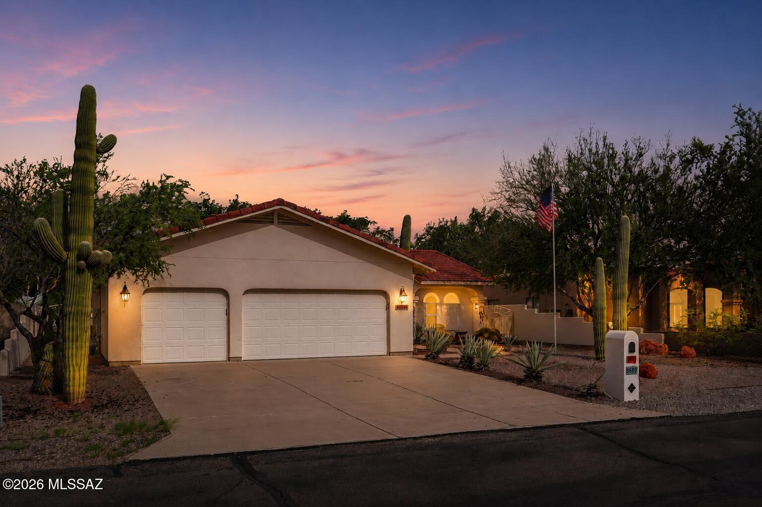 Welcome to Maya Estates, a private and intimate community with just 28 homes! This charming 3-bedroom, 2-bath home offers a spacious 3-car garage and an impressive backyard that feels like your own private park. The expansive outdoor space features a putting green, mature landscaping, and plenty of room to relax, entertain, or enjoy Arizona's beautiful weather. Inside, the home offers a comfortable layout with plenty of potential to make it your own. A brand-new 2026 roof provides added peace of mind for years to come. Ideally located in northwest Tucson, this home offers convenient access to shopping, dining, parks, golf, schools and major roadways. Enjoy nearby amenities along the Oracle Road corridor, including Tucson Mall and a variety of shopping and restaurants, with easy access to I-10. The home is also conveniently located near Ironwood Elementary, Tortolita Middle School and Mountain View High School. With its private neighborhood setting, just 28 homes, generous lot, exceptional backyard, putting green, 3-car garage and brand-new 2026 roof, this home offers a wonderful combination of privacy, comfort, outdoor living and convenient northwest Tucson location.