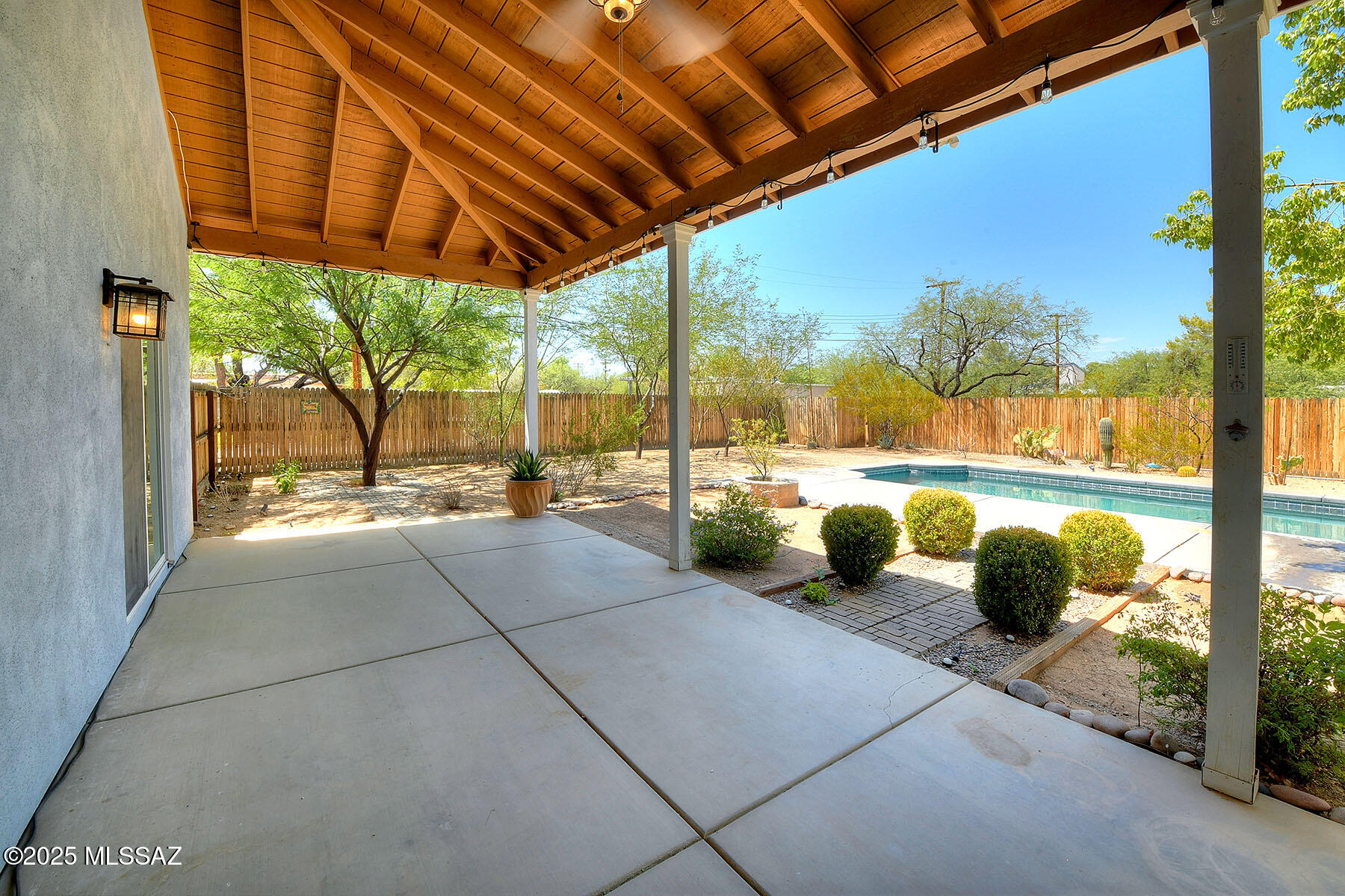 Great Value in Prime Location.  Don't let this one get away!  Move-in Ready Contemporary Ranch-style Home on a Large Lot in one of Tucson's most sought-after Central Neighborhoods, one block from the Campbell Corridor.  A Design-Forward Floor Plan with Loft-Studio.  High Vaulted Ceilings & Light-filled Rooms.  Spacious Kitchen, Huge Laundry Room and a Secluded Master Suite with Walk-in Closet.  Charming Covered Porches, Front & Back, Sparkling Pool and Low-care Landscaping make this a Home for All Seasons.  You'll appreciate the Deep Setback Front Elevation and Circular Drive, plus a Pristine Oversized Garage.  Don't miss your window of opportunity.  It's a jewel!  Just minutes to U of A, Banner, Downtown, Restaurants, Shopping and all things Tucson