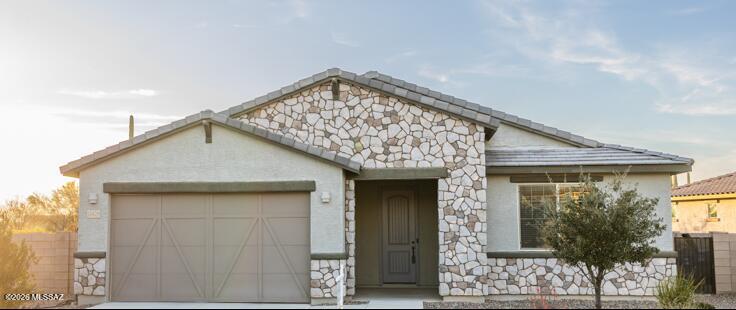 Range price offer $525,000-$550,000.
New listing in Saguaros Viejos, Oro Valley--pristine, move-in ready, and perfectly  positioned to capture those iconic Sonoran sunsets. Step inside to a bright, thoughtfully designed split floor plan that balances openness with privacy. The heart of the home is a stunning, fully updated kitchen with gorgeous finishes, abundant storage, large center island with seating, stainless steel appliances, and a walk-in pantry. Whether you're hosting friends or enjoying a quiet morning coffee, this kitchen lives as beautifully as it looks. The primary suite is a restful retreat, set on its own side of the home for added privacy. You'll love the spa-inspired bath with dual vanities, a walk-in shower, and a generous walk-in closet. Two additional bedrooms share a well-appointed full bath on the opposite side of the home, perfect for family or guests.  Enjoy a convenient pocket office just off main living area--ideal for homework, bill paying, or crafting--keeping life organized without sacrificing living space.  Additionally, a separate den offers flexible space for a home office, playroom, or guest space, which adds valuable versatility without impacting the main living area. Out back, the west-facing yard is a showstopper--no rear neighbors and a natural desert backdrop that feels endless. The yard is spacious and versatile, with plenty of room to add a pool, outdoor kitchen, or more. Imagine year-round indoor/outdoor living in true Oro Valley style.