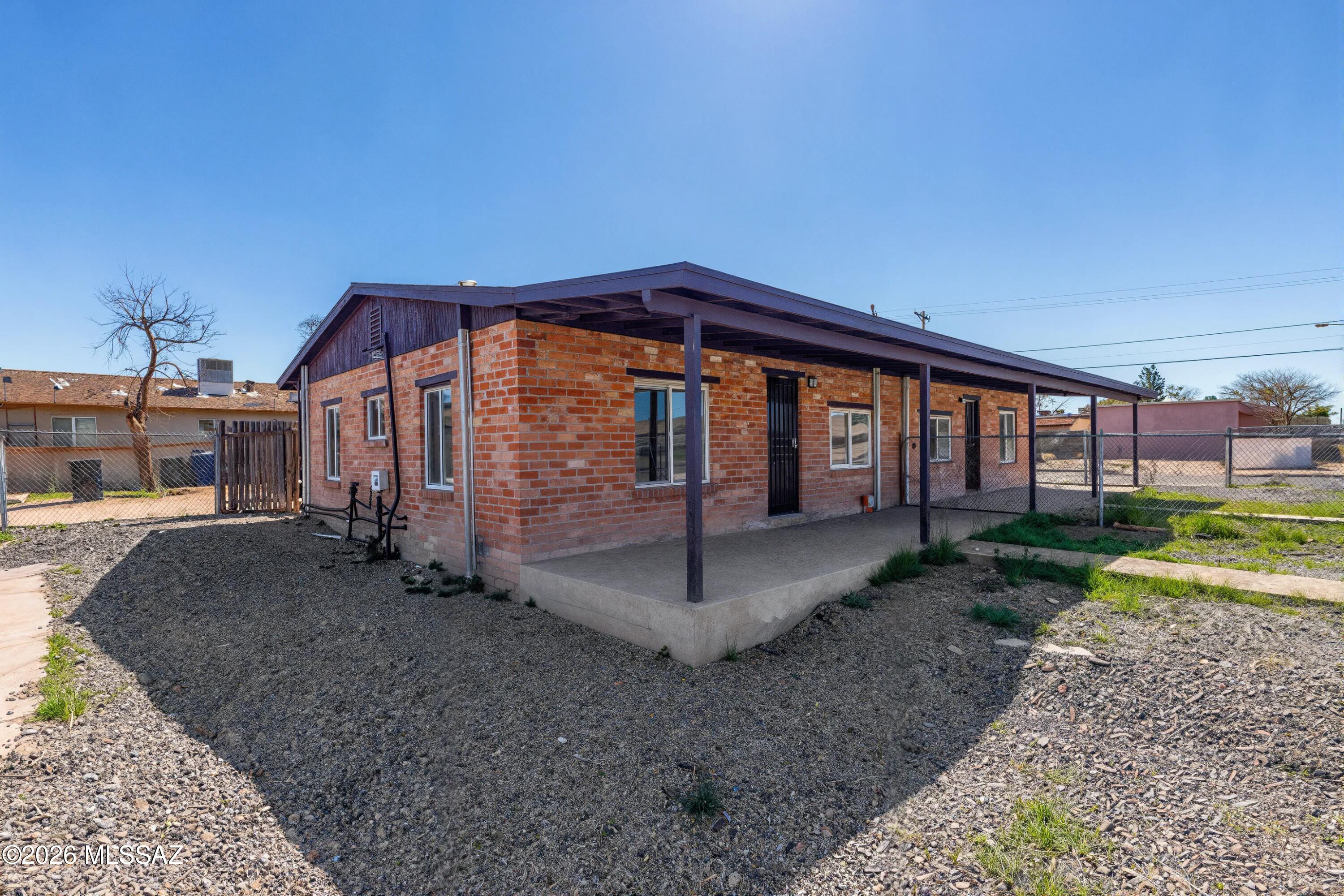 A well performing duplex on a corner (R3) zoned lot with large vacant space to potentially develop another unit or have storage space with separate driveway entrance. Long term tenants in place on month-to-month lease. Rents haven't been increased since 2022. Separate yards, separate electric/gas meter, separate W/D hook-ups. Renovated in 2022 that included new mini-splits, new water heaters and new kitchens. Note: The parcel has 3 addresses: 4119 (vacant land), 4121 and 4123. Owner/Agent