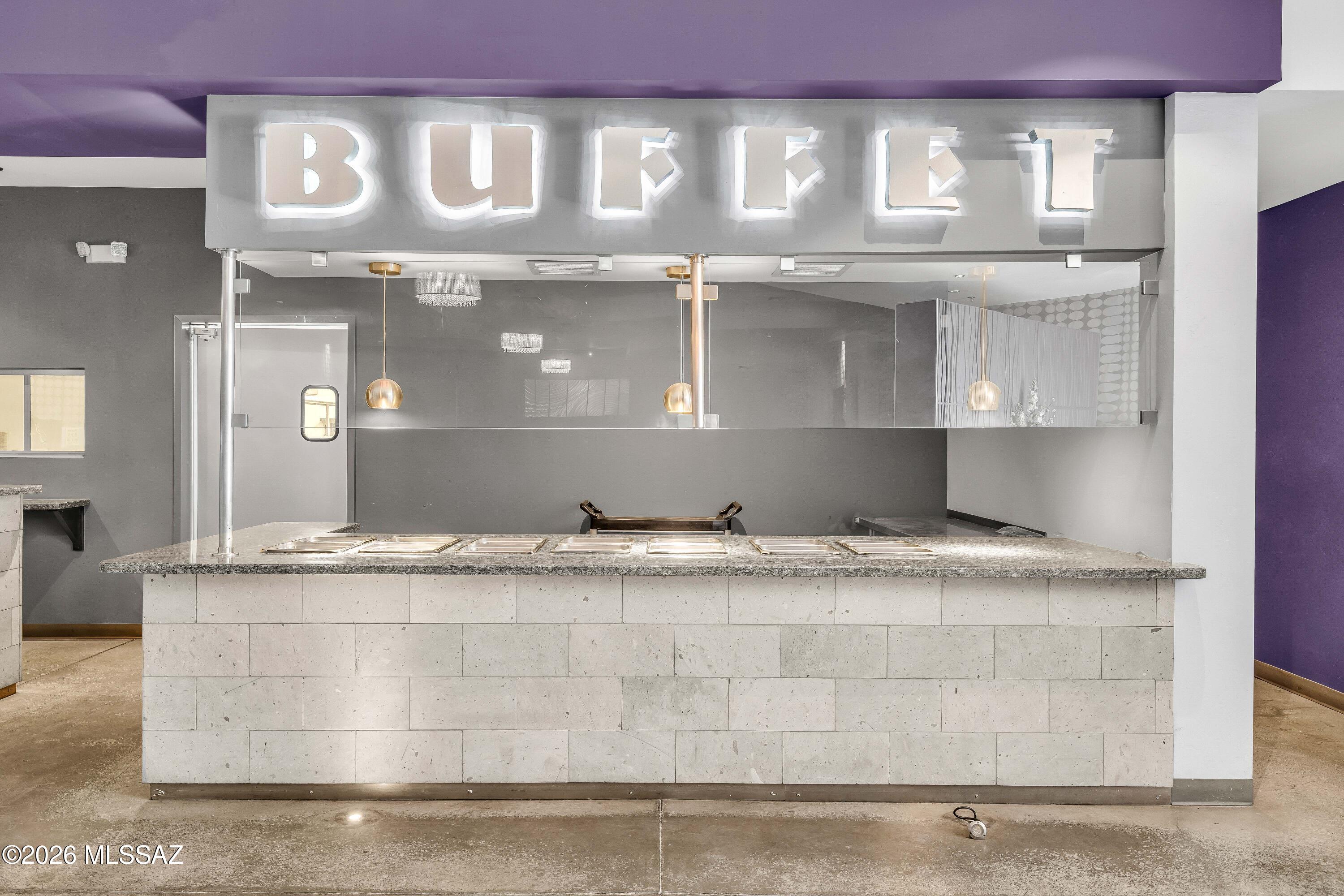 Built in 2014, this turnkey restaurant opportunity offers a fully improved commercial space ready for its next owner. Property includes a completely equipped commercial kitchen, available furniture, buffet bar, register area, and a functional layout designed for efficient service and customer flow. Multiple parking lots provide ample on-site parking for guests and staff. Designed and built by renowned TAC Architects, the building offers quality construction, attractive design, and strong curb appeal. Excellent opportunity for an owner-user or investor seeking a move-in-ready restaurant property.