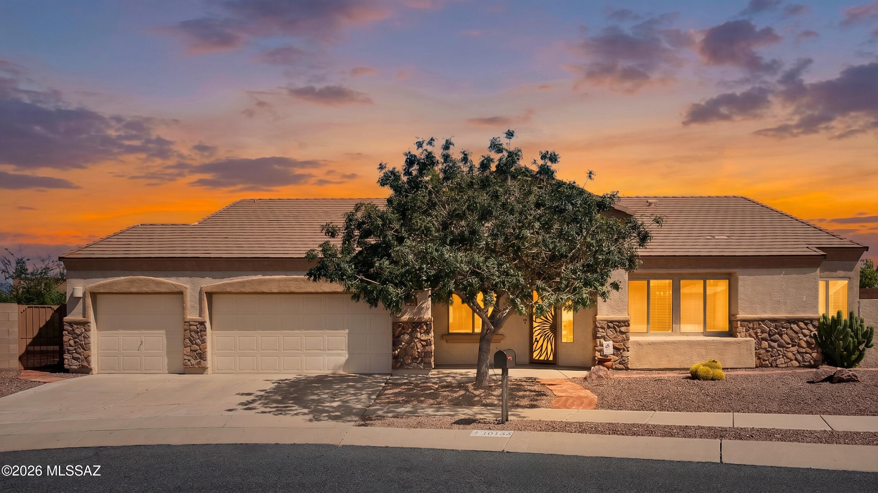 Seller will accept or counter offers between $449,900 and $465,000. Own your slice of desert living on 1.5 acres taking in views of the Catalinas & Rincons from the privacy of your own backyard w/ over 20 bird species! At the end of a quiet cul-de-sac, offering 2 x 6 construction, cathedral ceilings, FIVE bedrooms, 2.5 baths, w/ a functional split floorplan, your options are endless! Solar Screens on windows. Equipped w/ 2 living areas & generous dining space--ideal for everyday living & entertaining. Updated kitchen features custom cabinetry, full slab granite counters, bar seating, wine cooler & stainless steel appliances. Primary suite is upgraded w/ grande shower w/ glass surround, 2 mosaic shower niches, dual vanity, walk in + extra closet, all w/ a private entry to the backyard.