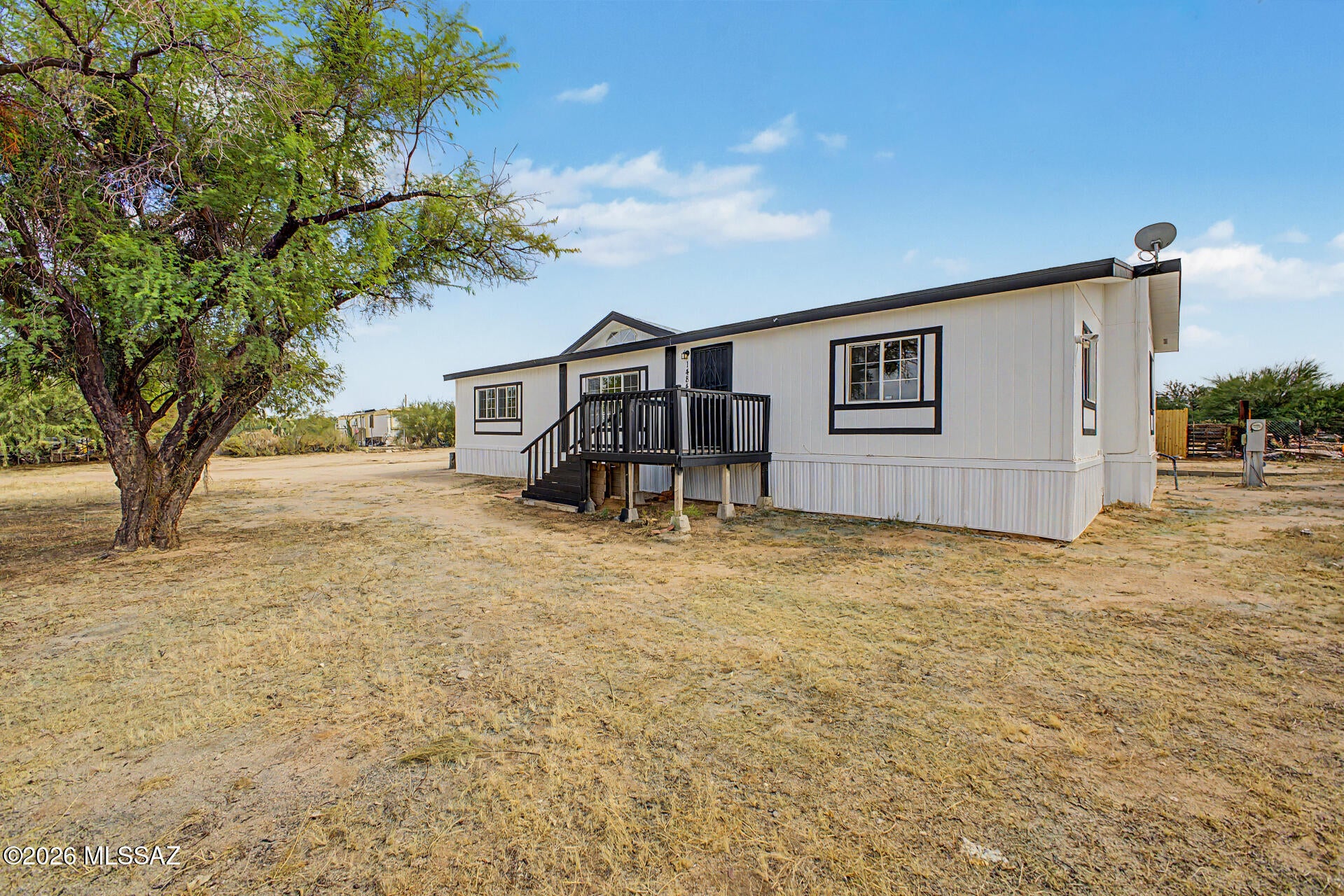Fantastic opportunity to own this 3-bedroom, 2-bath manufactured home on a sprawling 1-acre lot! Inside, you'll find an appealing open layout with vaulted ceilings, a soothing palette, and attractive wood-look flooring. The well-appointed kitchen comes with crisp white shaker cabinets and ample counter space. Have a good night's rest in the main bedroom, which includes a private bathroom and a convenient walk-in closet. Unwind at the end of a long day on the covered deck, which offers the perfect spot for al fresco dining or refreshing drinks. The vast outdoor space features a large shed for extra storage, tons of space to craft your dream oasis or establish equestrian facilities, and majestic mountain views that provide a picturesque backdrop. Make it yours today! Owner/Agent