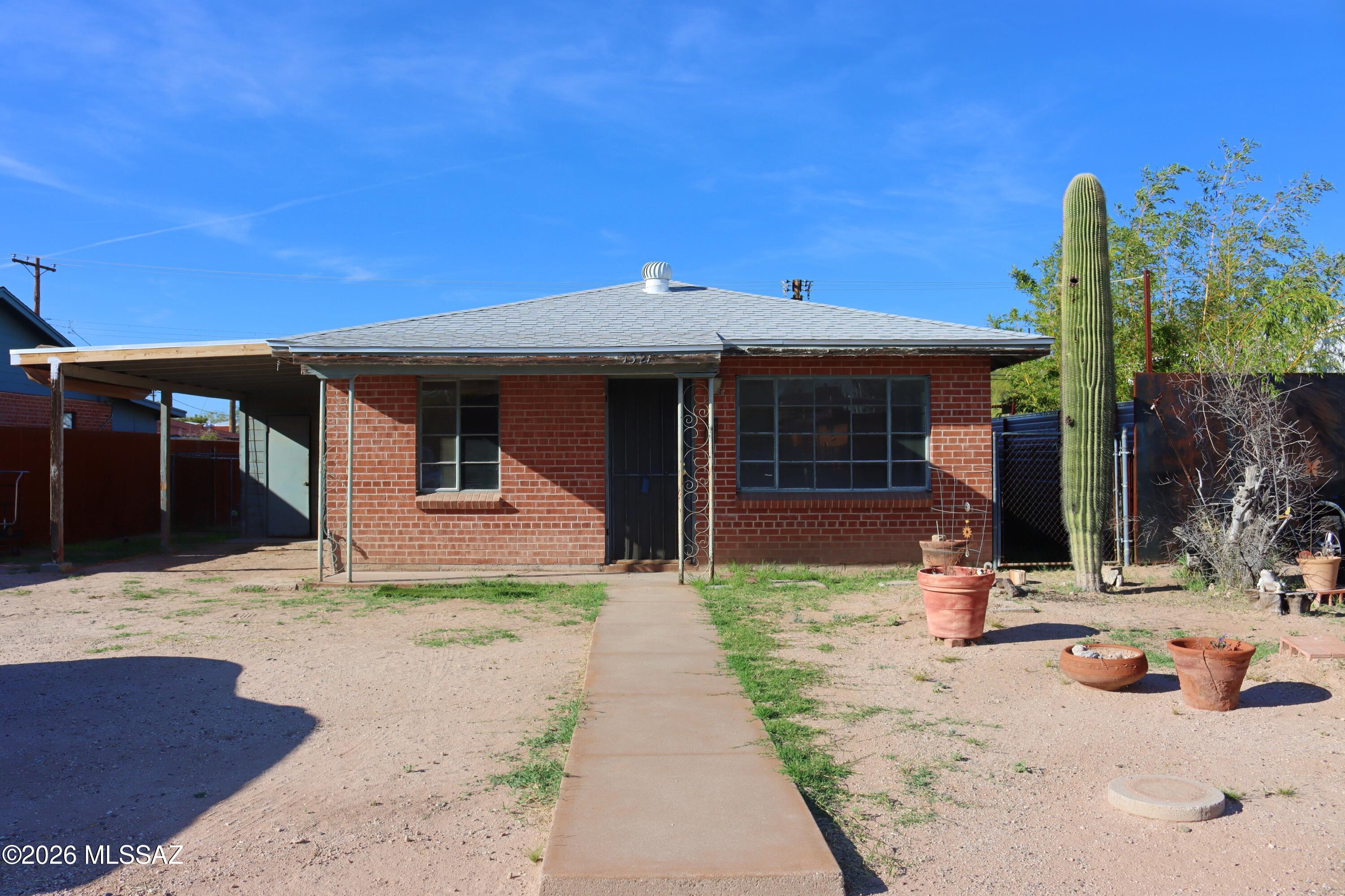 One family home built in 1955 needs new owners to come and bring it back to life. 996 SqFT. 3 BdRm-1 BA does have new roof Dec 2024, New A/C Feb 2025. Priced AS-IS and no repairs will be made. Zoned R-2 Tucson that may allow additional residential unit. Buyer to Verify. Great location near U of A, Banner Medical, and Tucson Downtown.