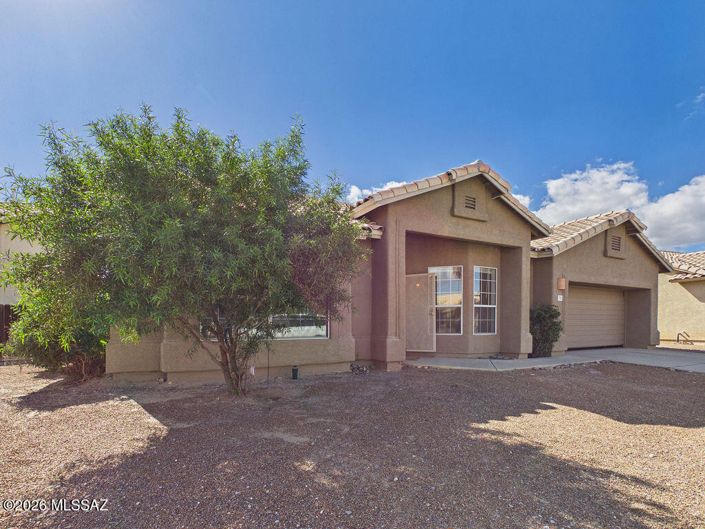 Step inside to discover this 3 bed/2bath home with a bright and open floor plan with generous living spaces designed for both relaxation and entertaining. This home boasts well-appointed bedrooms with plenty of natural light, along with a spacious primary suite that provides a private retreat complete with an en-suite bathroom and generous closet space. Outside, enjoy a low-maintenance backyard with room to create your own desert oasis--perfect for outdoor dining, gardening, or simply soaking in Tucson's stunning sunsets. The property also offers a covered patio and ample space for entertaining.