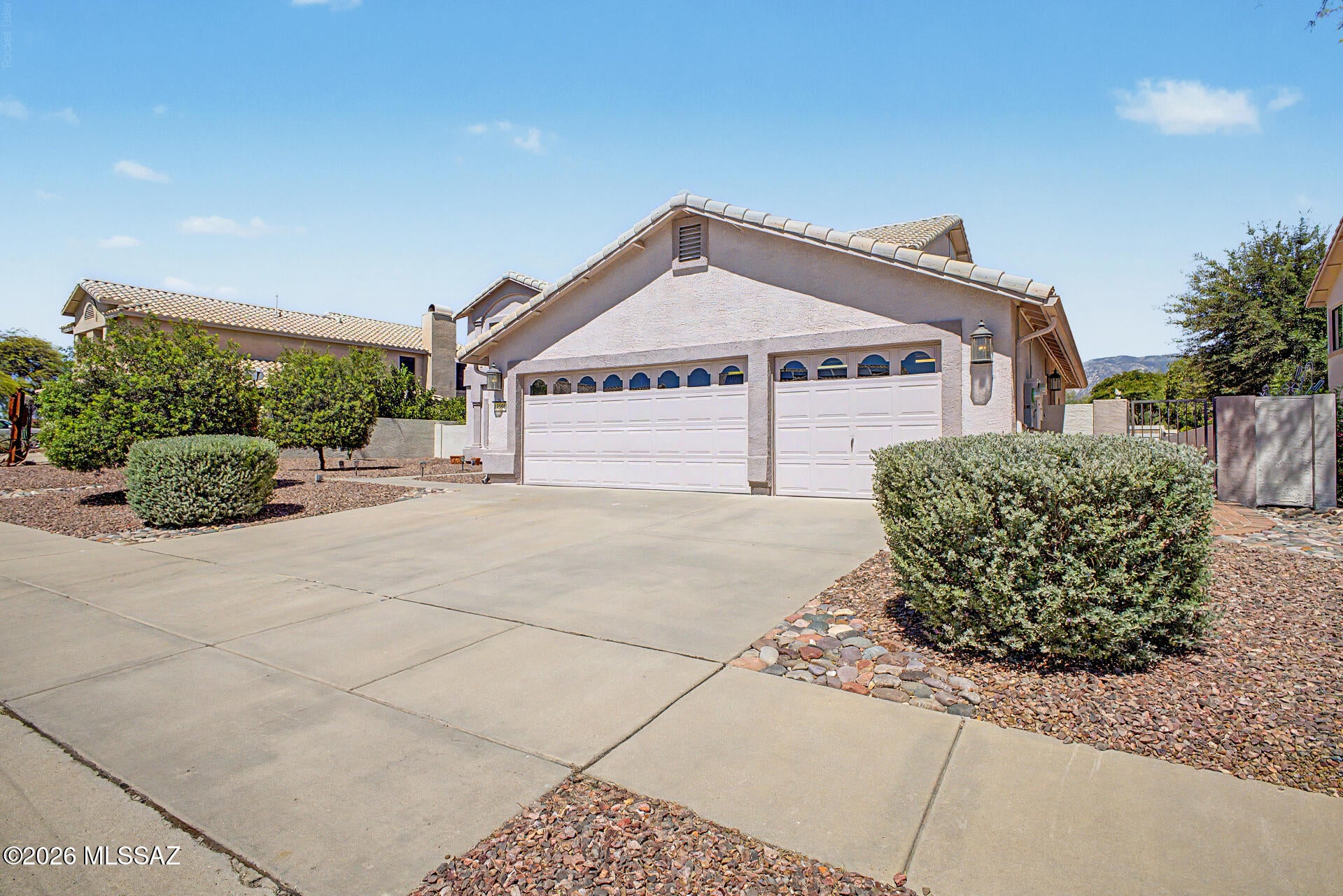Stunningly updated 3-bed, plus a den and a loft, 3-bath Rancho Vistoso home showcasing spectacular Catalina Mountain views! The bright, open floor plan features a flexible loft, a private den, wood-look flooring, and plantation shutters throughout. An entertainer's dream, the spacious kitchen offers granite countertops, a center island, and a sunny breakfast nook. The upstairs primary suite is a private retreat with vaulted ceilings, a soaking tub, and a view-facing balcony. Step outside to a pristine backyard oasis featuring a covered patio, custom paver seating, and a putting green. Topped off with a rare, oversized 4-car garage and a location minutes from world-class hiking, golf, and shopping--come see this one today!