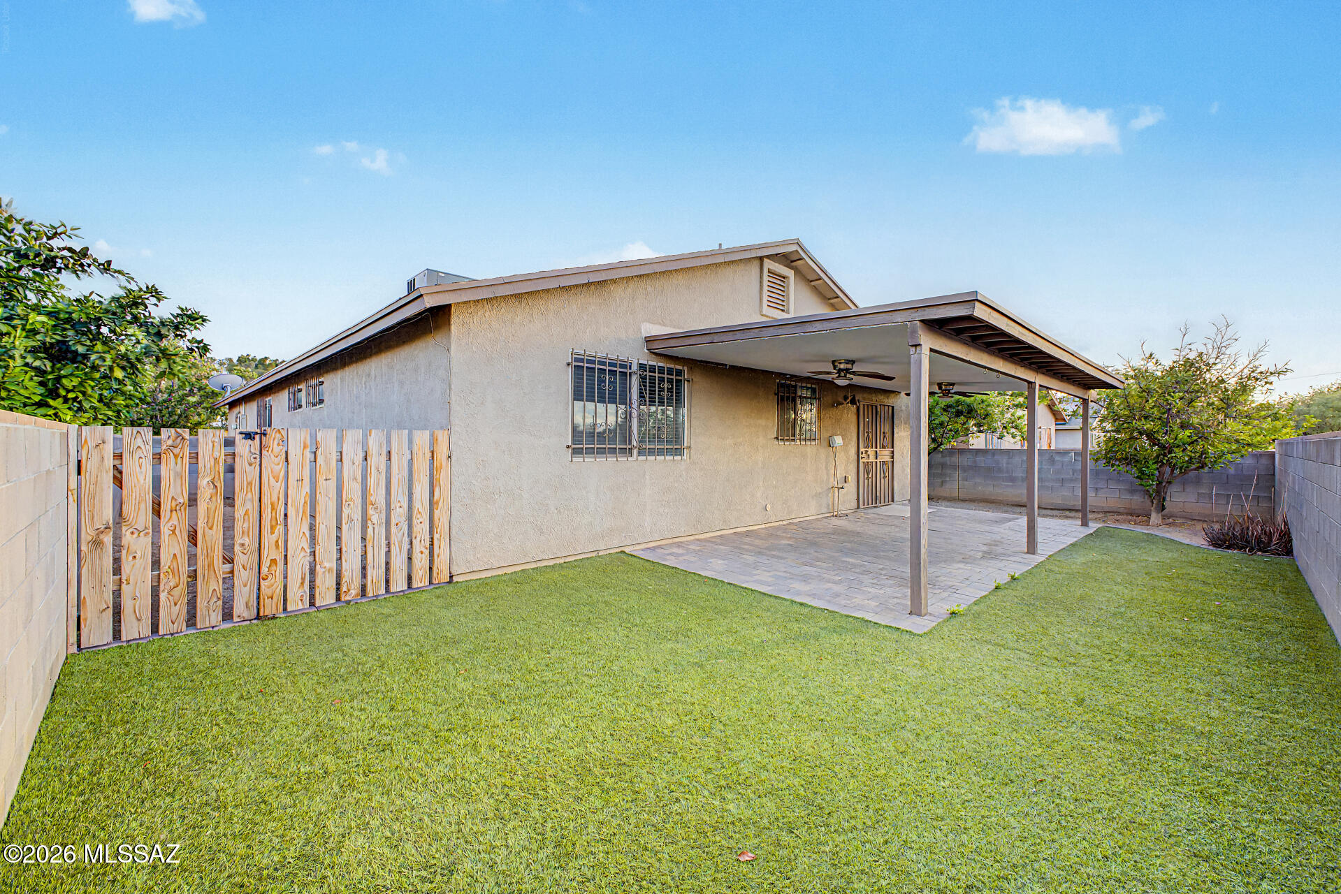 This charming single-level home is the one for you! Great curb appeal, with an easy-care landscape and a 2-car garage. Inside, you'll find bright and inviting living spaces designed with comfort in mind, featuring pristine tile flooring, plenty of natural light, and neutral paint that works great with any decor. Whip up your favorite dishes in the kitchen equipped with plentiful storage cabinetry, tile backsplash, tiled countertops, and stainless steel appliances. The main bedroom promises a good night's sleep, hosting a full bathroom for extra comfort. Out back, you'll have a cozy covered patio with pavers, perfect for entertaining and relaxing after a long day, and a grass area perfect for games. Check it out before it's gone!