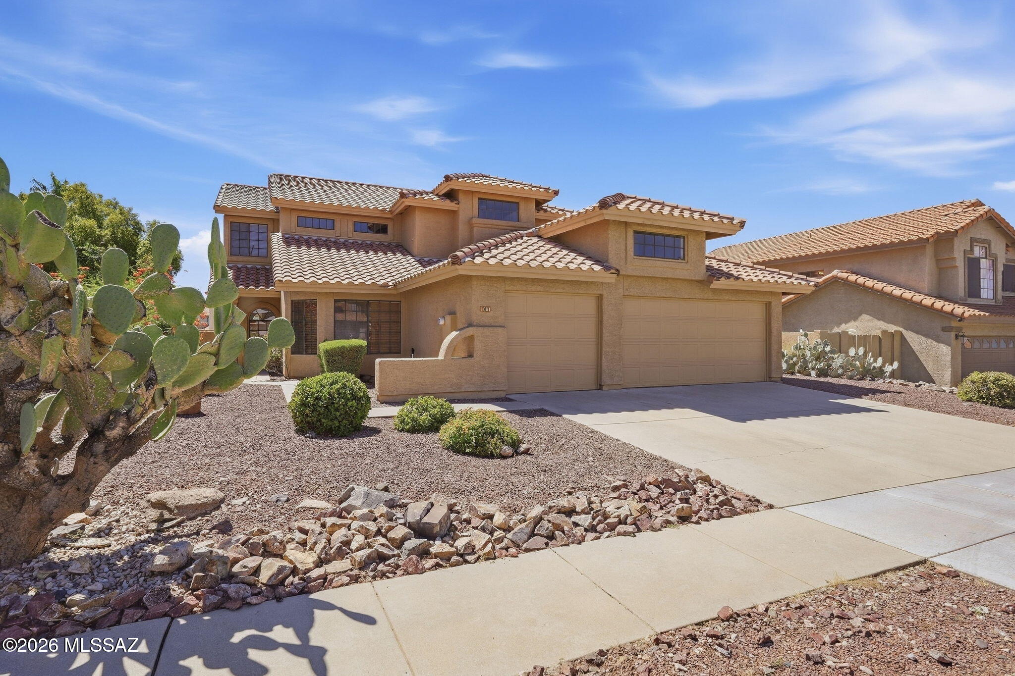 Welcome to this contemporary 4-bed, 3-bath, two-story home in Copper Creek, 2,464 sq. ft. with a 3-car garage. North-facing on a quiet street, near the neighborhood park.

Flexible front room with large windows, plus a formal dining room connecting to the kitchen. Great room with wood-burning fireplace and wet bar. Kitchen offers granite counters, stainless appliances, and a breakfast nook. A 4th bedroom with full bath is downstairs. Upstairs, the primary suite has a private balcony, en-suite bath with separate tub/shower and double vanity, and two bedrooms sharing a Jack-and-Jill bath. Assigned schools are Wilson K-8 and Ironwood Ridge High School.

Low-maintenance yard with mature bushes and citrus trees. Newer roof and HVAC . No polybutylene piping.