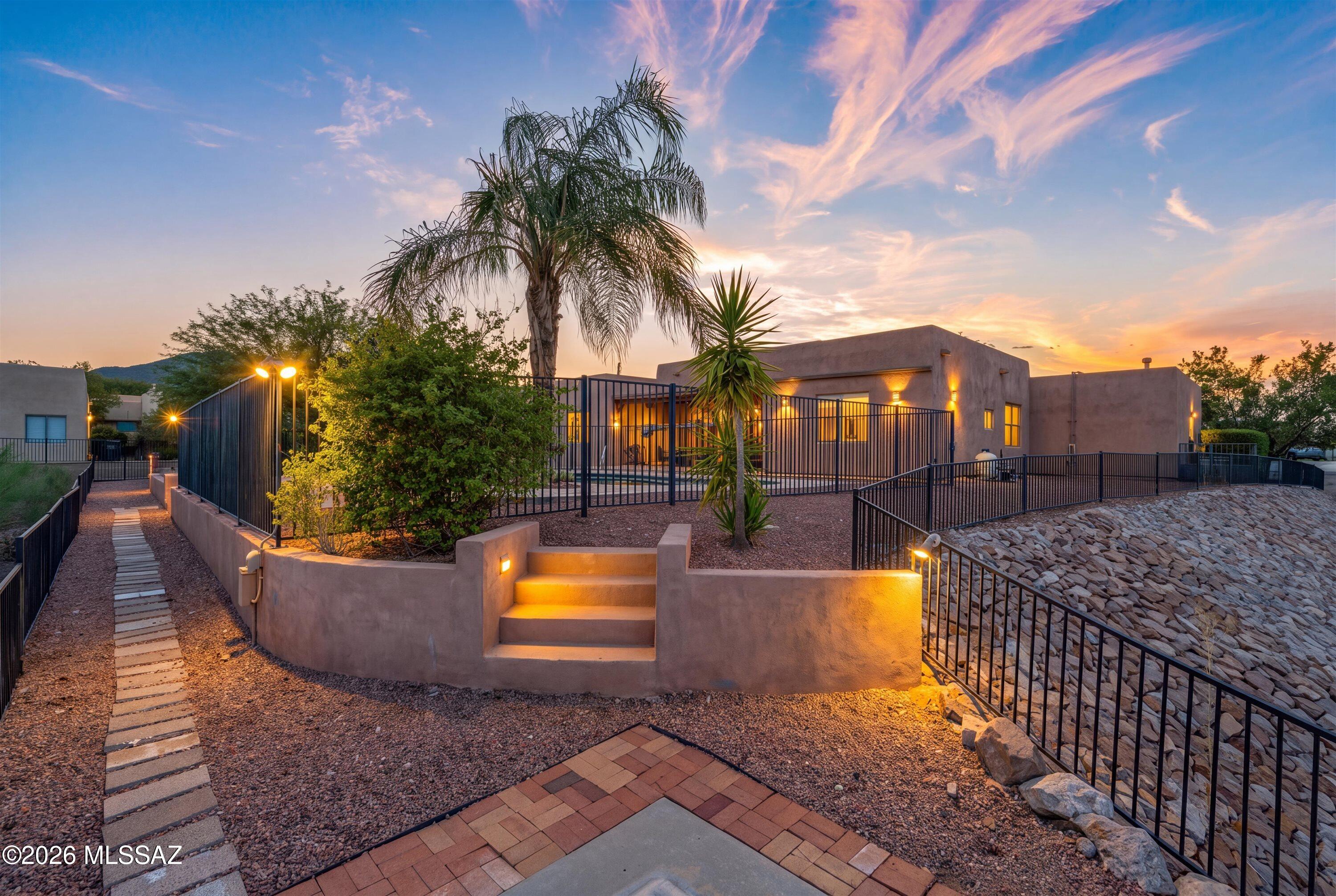 WEST SIDE RETREAT! 4 BED, 2 BATH w/ POOL & 3-CAR GARAGE
Welcome to this stunning 4 bedroom, 2 bathroom home in Tucson's sought after West side. The view fencing sets the tone, offering privacy without compromising the sweeping desert and mountain vistas that make this location so special.
Inside, an open and light-filled floor plan welcomes you. The kitchen flows effortlessly into the great room and dining spaces, making it ideal for hosting gatherings or simply enjoying day to day life. 4 generously sized bedrooms offer flexibility for family, guests, or a home office. The backyard is where this home truly shines. A sparkling pool anchors the outdoor space perfect for cooling off on warm Arizona afternoons. The view fencing keeps the sight lines wide open, so you can soak in breathtaking sunsets from the patio, poolside, or the comfort of your living room. Plenty of space remains for lounging, grilling, and entertaining.
Car enthusiasts, hobbyists, or anyone needing extra storage will appreciate the extended 3 car garage a rare find that adds everyday convenience and versatility.
Situated on the West side, you're minutes from shopping, dining, parks, and quick freeway access, all while enjoying the easygoing pace of a well established neighborhood.
