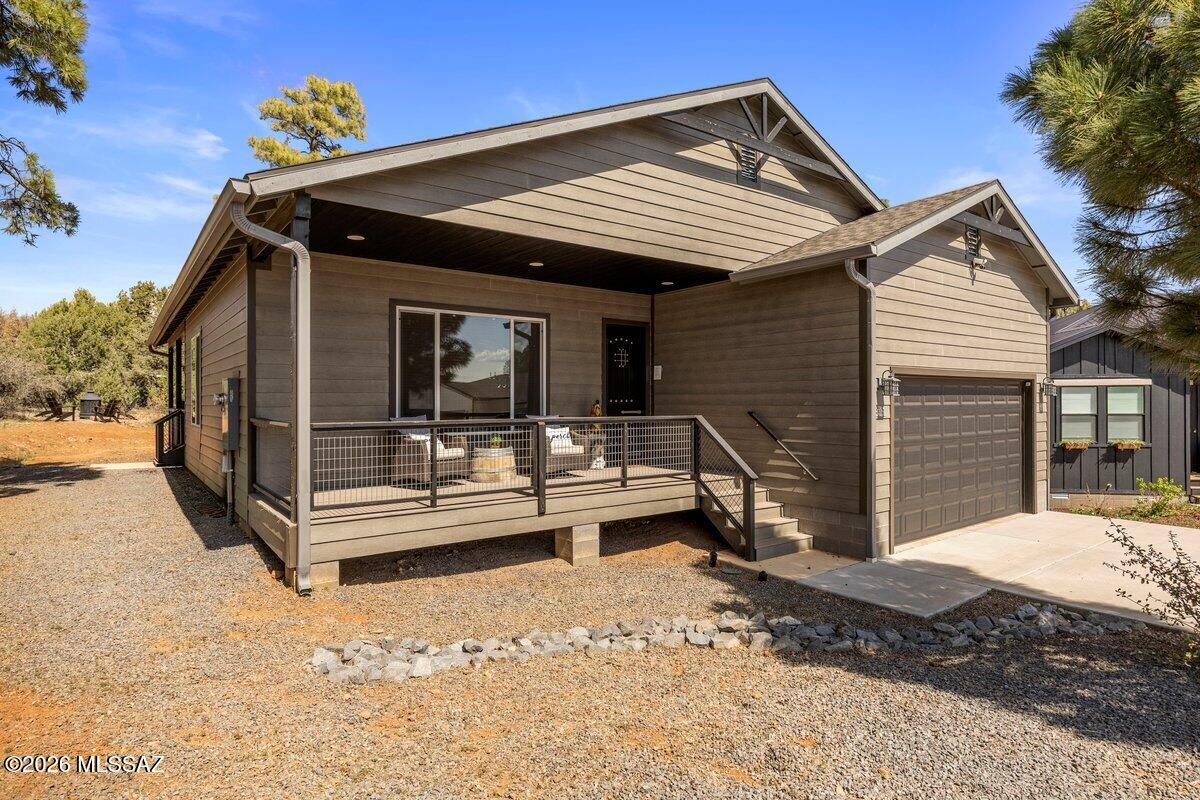 Turnkey Home in the Heart of Show Low - Prime Investment Opportunity This is the home you've been waiting for!
Centrally located in Show Low on a desirable cul-de-sac lot, this beautifully maintained 3 bedroom, 2 bathroom home offers comfort, style, and income potential all in one. Situated on a spacious quarter-acre, you'll love the large back deck--perfect for enjoying cool mountain summers. Inside, the home features numerous upgrades including luxury vinyl flooring, gorgeous granite countertops, and a tankless on-demand gas water heater with water softener. LP siding and Trex decking add durability and low maintenance. The split floor plan offers privacy, with a spacious primary suite featuring a soaking tub, acrylic surround shower, and large walk-in closet. The guest bathroom includes a sleek acrylic shower with sliding glass doors. Currently operating as a successful short-term rental, this property presents an excellent investment opportunity--whether you're looking to generate income, own a second home, or both. Don't miss your
chance to own a versatile, move-in ready home in one of Show Low's most convenient locations!