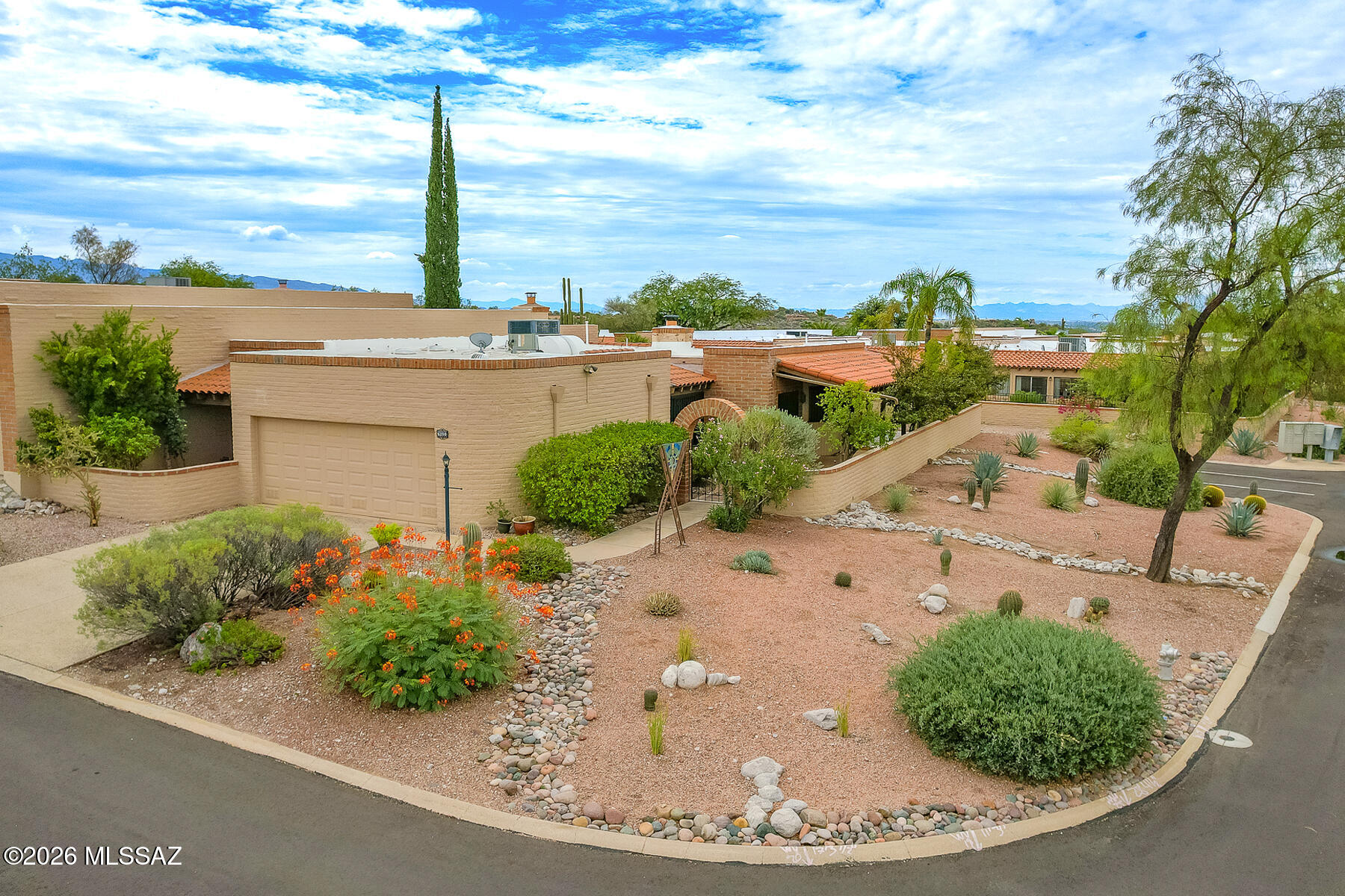 Priced Reduced! Seller will entertain offers from $499,000-$515,000. Estate Sale! Appraised at $525,000. Spacious 3BR/2BA foothills townhouse located in sought-after Sunrise Ridge Townhomes in Fairfield!  Large private corner lot has buffers on 3 sides and offers wonderful views.  Walled yard areas w/mature landscaping.  Wrap around covered patios w/Saltillo tile.  Spacious floorplan with 1935 square feet of living area.  Kitchen w/oak cabinetry & updated appliances. Large living & dining rms.   Large primary bedroom w/walk-in closet. Primary bathroom w/dual sinks & walk-in closet. The 3rd BR/office w/patio & views. Plantation shutters. 2018 Trane HVAC unit. Roof serviced w/warranty. Near community pool. Some updating needed but incredible value. See More link and agent only remarks. Drought-tolerant and drip-irrigated easy-care xeriscape with west-facing mature shade trees - lower water & electricity bills. Elegant wrought-iron secured sliding doors, windows, and front entrance; safely enjoy cool early morning and evening monsoon breezes from the Catalina Mountains.

See copy of $520,000 appraisal in attached documents.