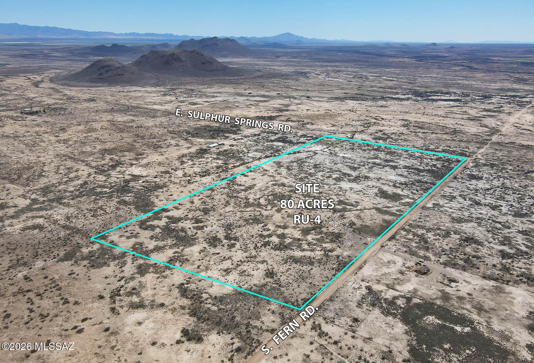 Over 80 acres of fenced and gated high-desert land with sweeping open vistas and electric power at the lot. This corner parcel offers easy access and measures roughly ½ mile long by ¼ mile deep, providing plenty of space to create your vision. Versatile RU-4 zoning allows for a custom home, small ranch, agricultural use, or private desert retreat. The property qualifies for the Cochise County owner/builder opt-out, making it ideal for those planning to build independently. Located about 20 minutes from Willcox for shopping, services, and I-10 access, and just minutes from the vineyards and tasting rooms of the Willcox wine country. A rare opportunity to own a large piece of Arizona's scenic high desert with wide skies, mountain views, and room to grow. **Cash only sale, no seller carry.