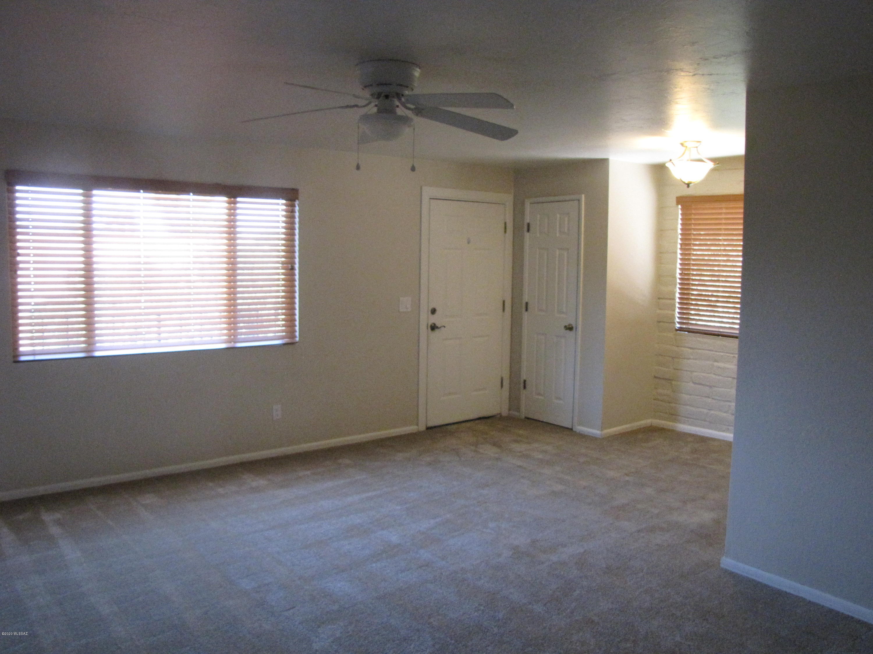 Upstairs 2 bedroom, 1 bath condo with Mt.Views.  Updated kitchen and bath. Very clean.  Ceiling fans. New thermo windows.  Extra storage in carport.  Close to Community pool.  Not pet friendly, no yard.