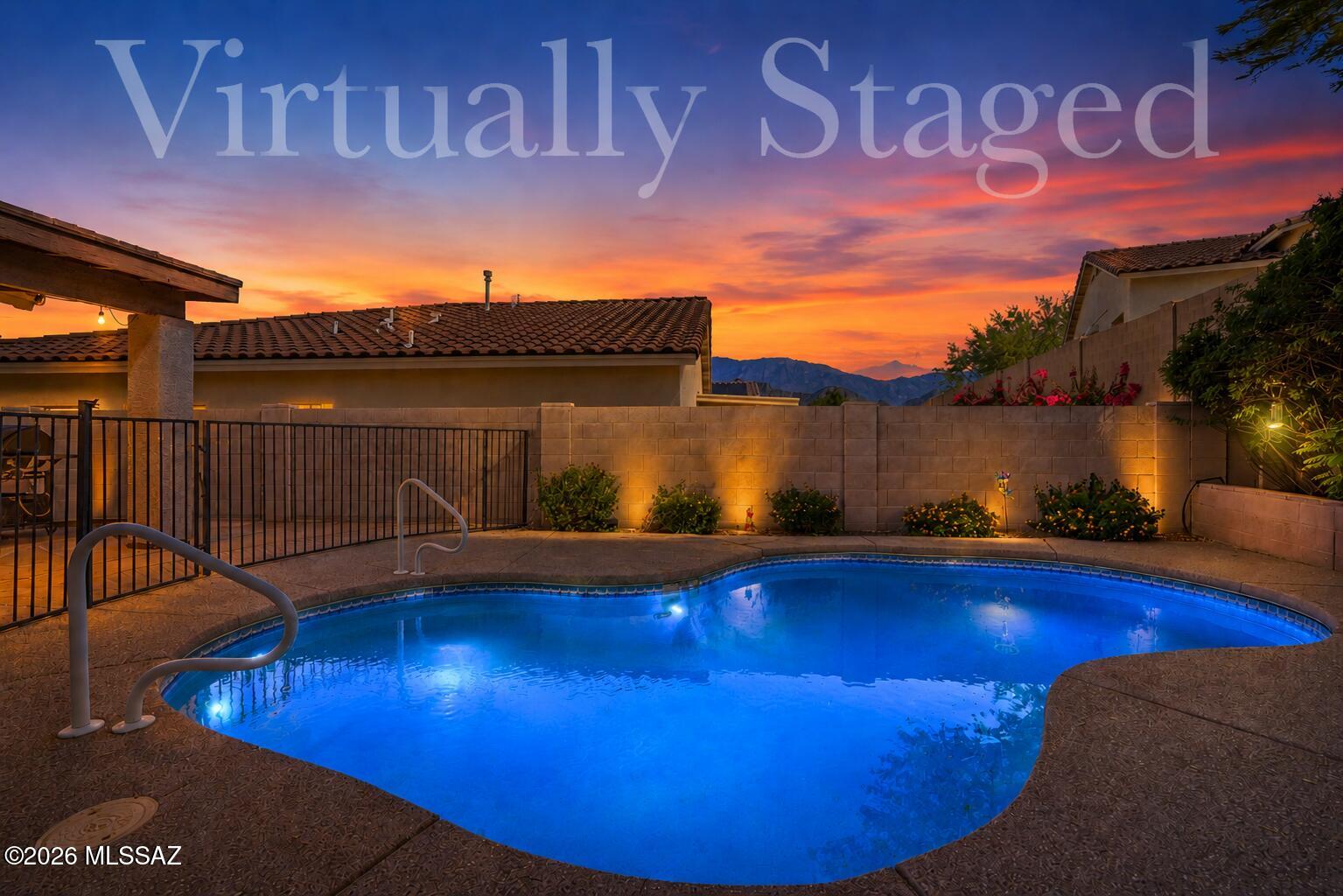 Enjoy the best of Rancho Vistoso living in this light-filled 3-bedroom, 2-bath home with mountain views and a private backyard retreat. Vaulted ceilings in living areas and abundant natural light create an open, welcoming atmosphere throughout the 1,650-square-foot floor plan.

The spacious kitchen offers an island with bar seating, pantry storage, stainless and black appliances, and a sunny dining nook. The primary suite features a walk-in closet, double vanity, garden tub, and separate shower.

Step outside to discover the true highlight of the property. The private backyard is designed for year-round enjoyment with a refreshing pool, expansive flagstone hardscaping, covered patio, citrus trees, and mountain views. High walls and High walls and mature landscaping create a peaceful setting ideal for relaxing or entertaining.

Situated on a slightly elevated lot with low-maintenance landscaping and a two-car garage, this home is conveniently located near Honeybee Canyon hiking trails, The Views Golf Club, Oro Valley Hospital, shopping, dining, and everyday conveniences. HVAC replaced in 2016. Well maintained and move-in ready, this home offers an outstanding opportunity to enjoy one of Oro Valley's most desirable communities while adding your own personal touches over time.